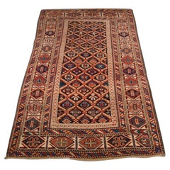 Antique Caucasian Dagestan Rug with Lattice Design on Dark Charcoal Ground