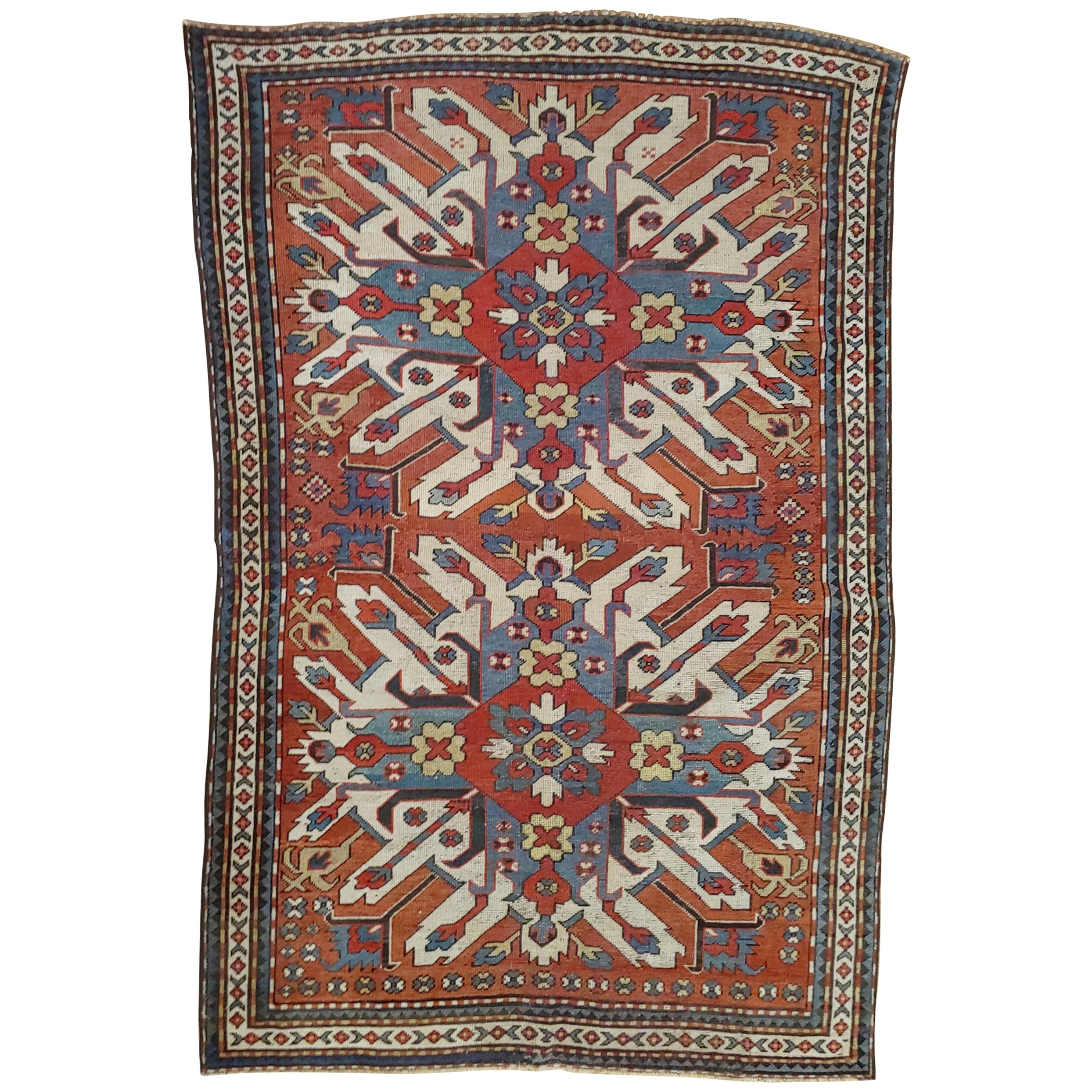 Antique Caucasian Eagle Kazak, Sunburst Design, Rust Field, Wool, Scatter, 1900 For Sale