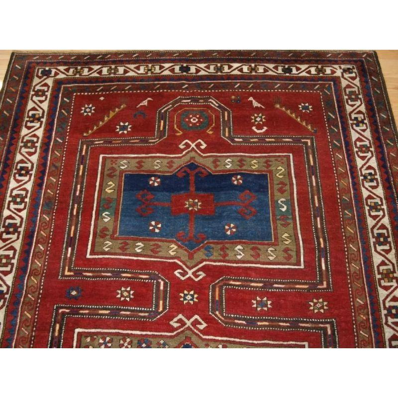 Antique Caucasian Kazak rug from the Georgian region around the town of Fachralo. This is a superb Kazak rug with a variation of the 'opposed niche' design. The rug has superb colour and is very well drawn.

The rug is in excellent condition with