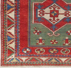 Antique Caucasian Fachralo Kazak with Tribal Design in Green, Red and Ivory