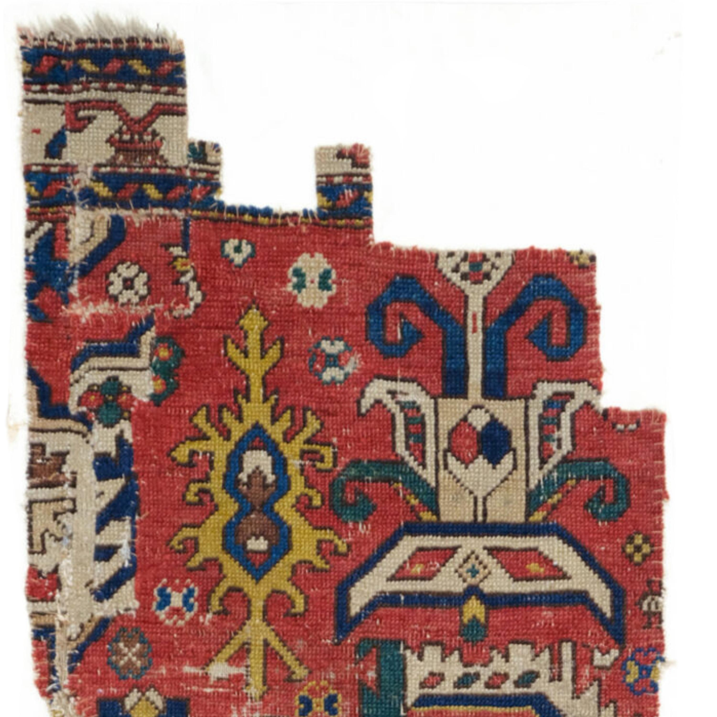 Antique Caucasian Fragment | Caucasian Rugs
18th Century Caucasian Rug Fragment
Size : 44×166 cm (17,3x65,3 In)

The squat medallion with its hooked profile and the field design of this fragment is closely related to rug in a Hamburg private