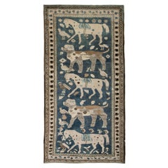 Antique Caucasian Garabagh Tribal Rug in a Grey and Blue Background