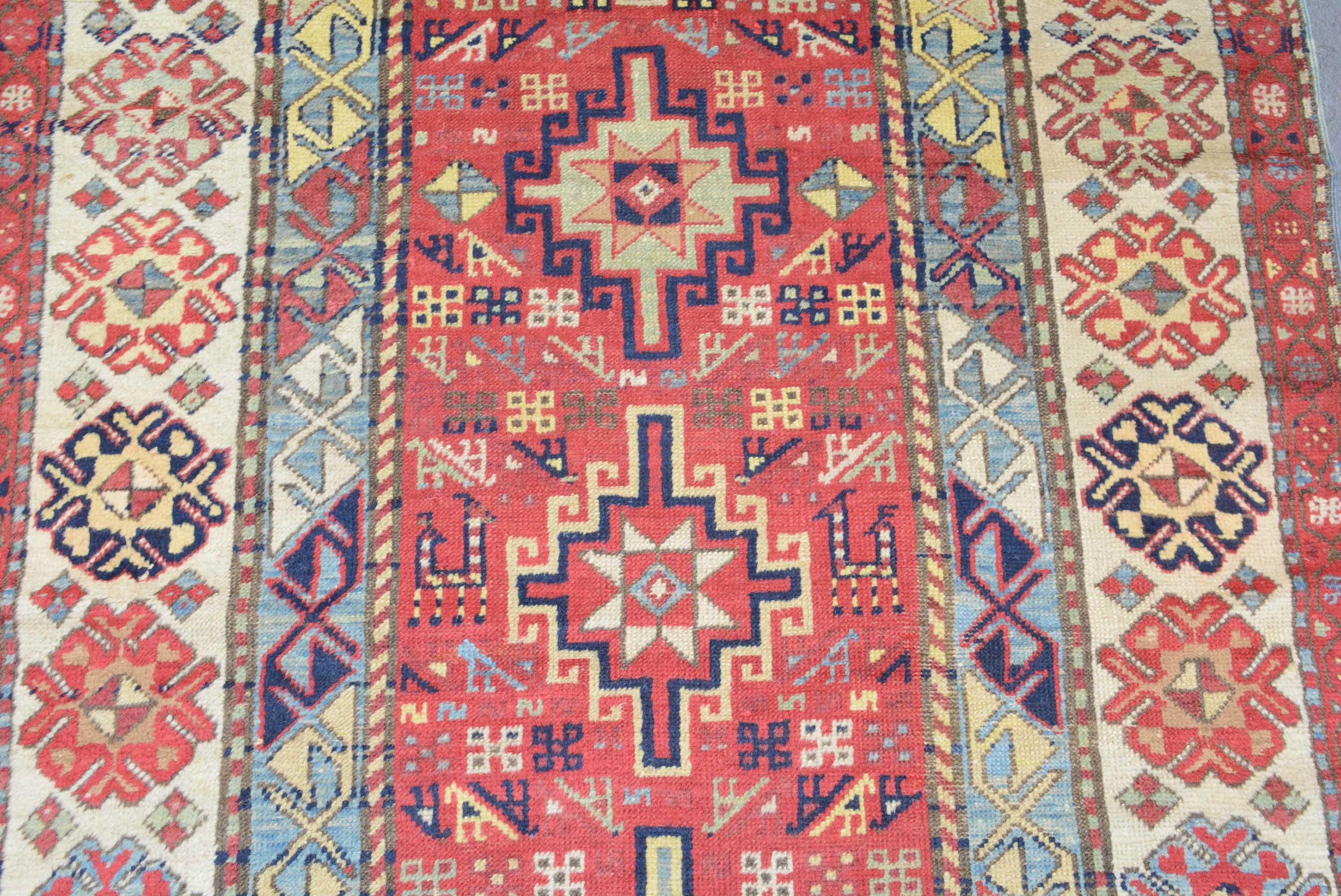Tissage Tapis caucasien ancien Gendje en vente