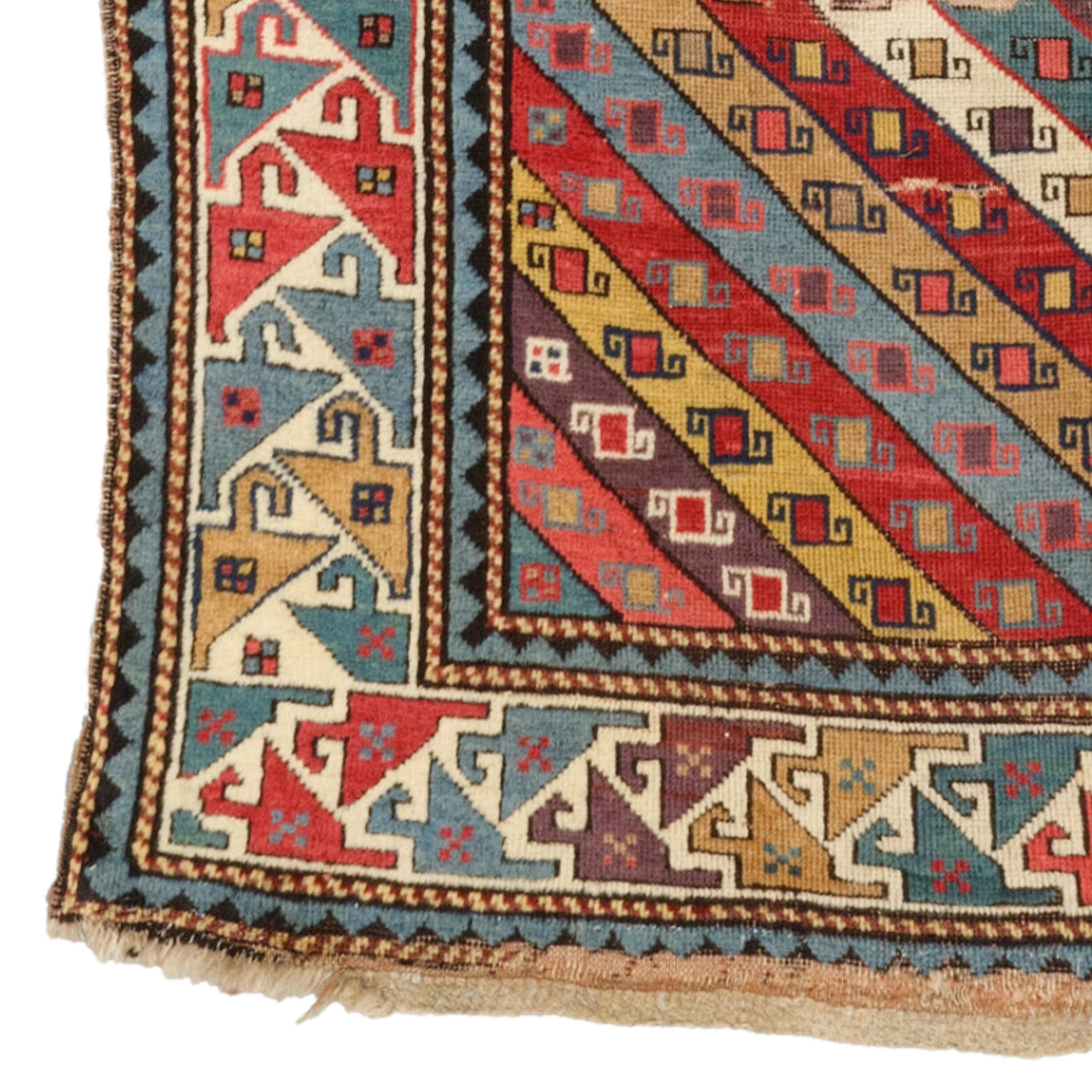 Middle Of the 19th Century Caucasian Gendje Rug
There is a small hole under the center of the top border.
Size: 107 x 196 cm (3,51 - 6,43 ft)

Add Color and History to Your Home: 19th Century Caucasian Gendje Rug

Would you like to add both color