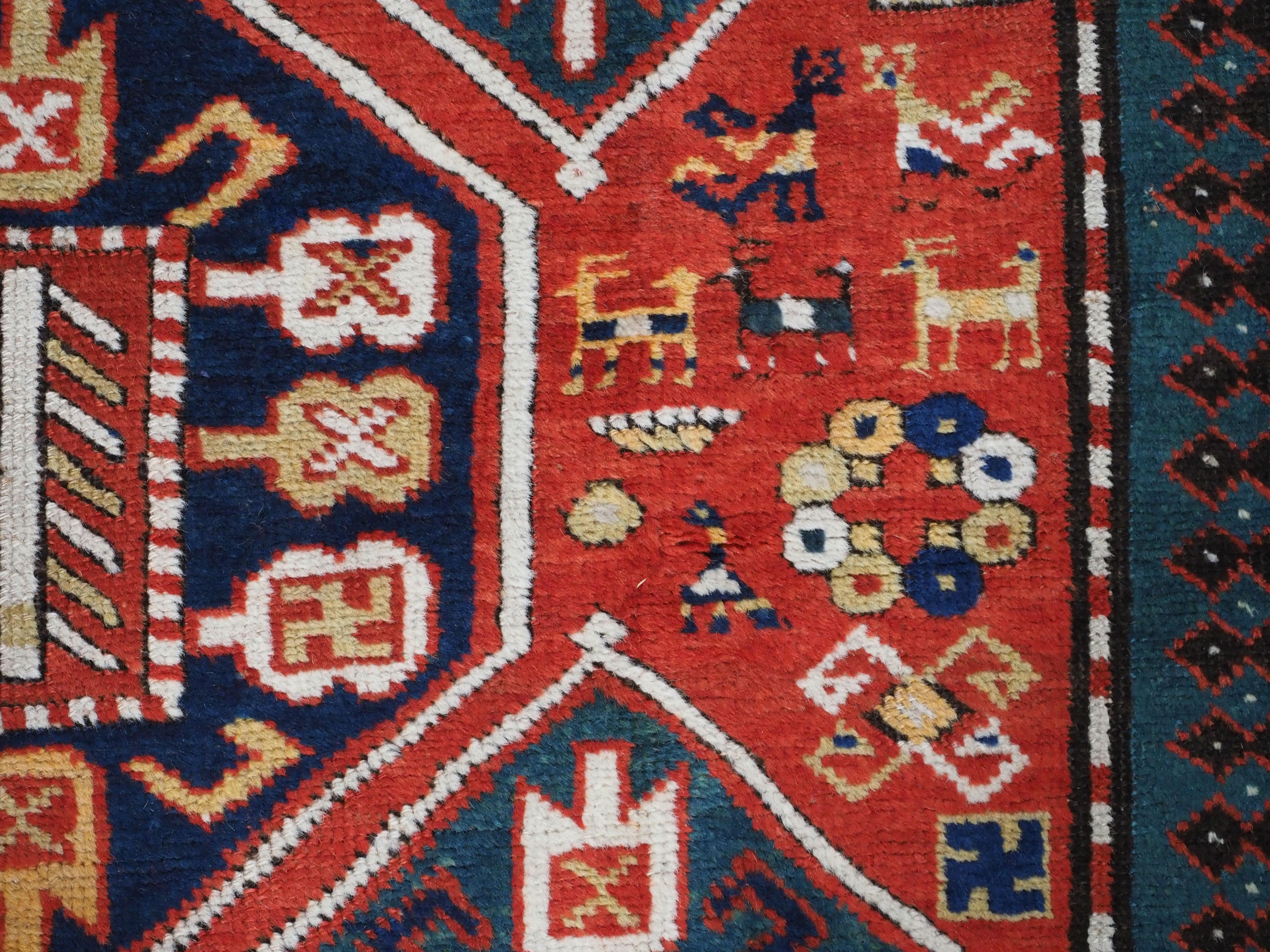 Antique Caucasian Gendje rug with wonderful folk art design.  Circa 1890. For Sale 7