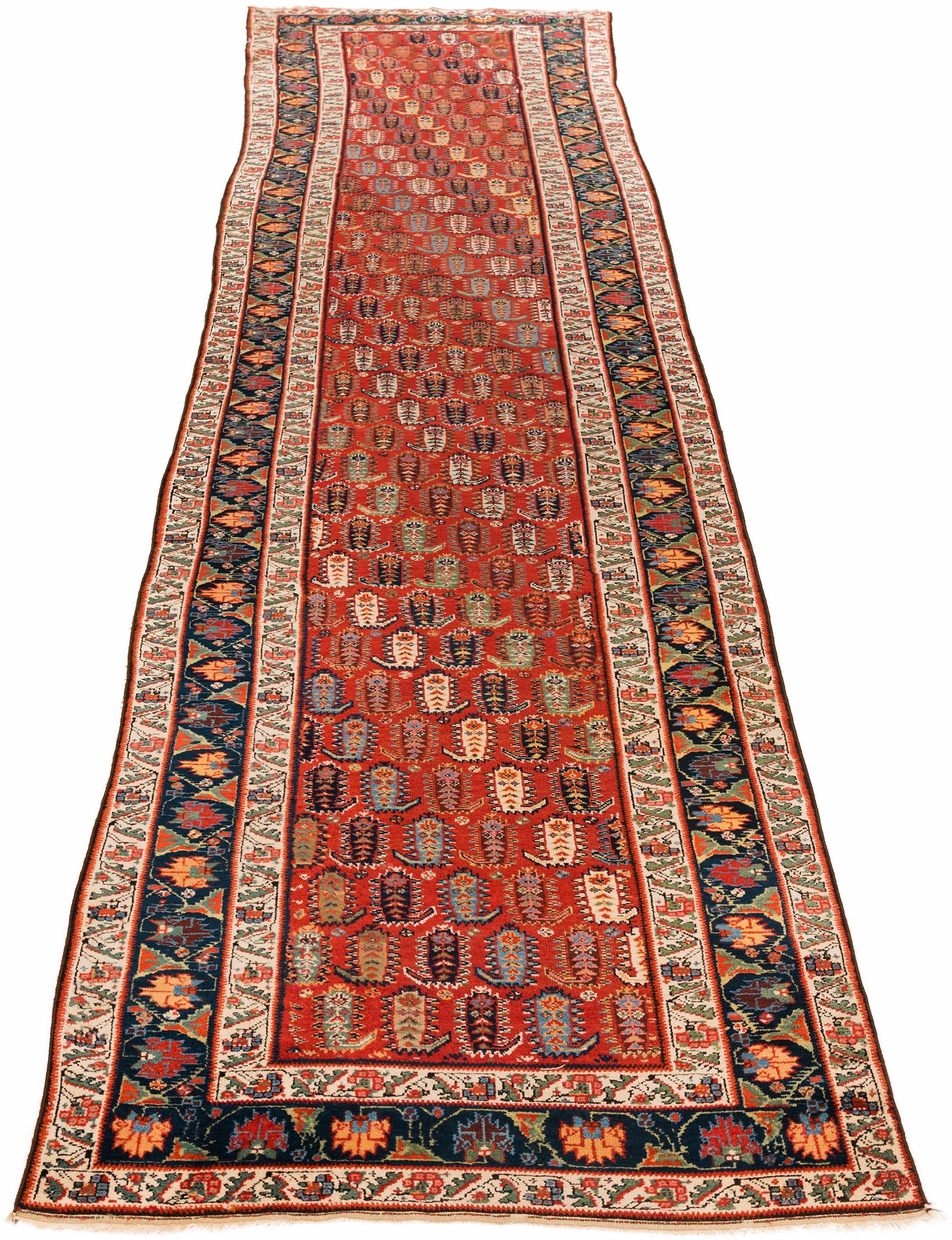 Tribal Antique Caucasian Genje Runner with Red, Green, Browns, and Blues Wool For Sale