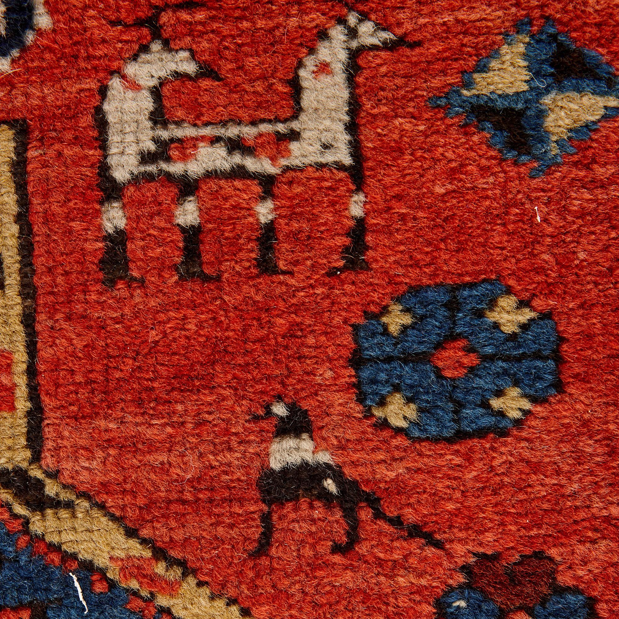 This beautiful wool rug was woven in circa 1870 in the Shirvan district of eastern Caucasus. This district is well-known for its history of producing fine rugs and carpets. Shirvan rugs began to be exported to Europe in great number in the late 19th