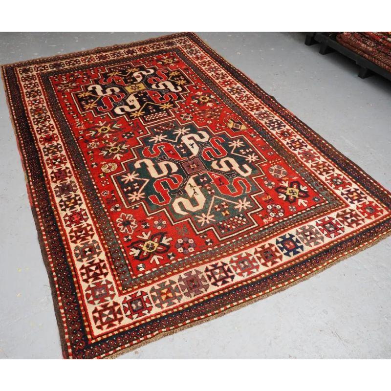Antique Caucasian Karabagh cloud band Kazak rug, Circa 1900. These rugs were woven by Armenian weavers in the Duchy of Khachen in the town of Khondzoresk, they are known as cloud band Kazaks due to the cloud band design within the medallions.

The
