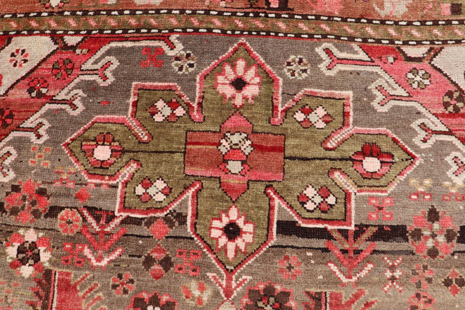 Kazak Antique Caucasian Karabagh Gallery Runner With Large Medallions Of Pink And Red For Sale