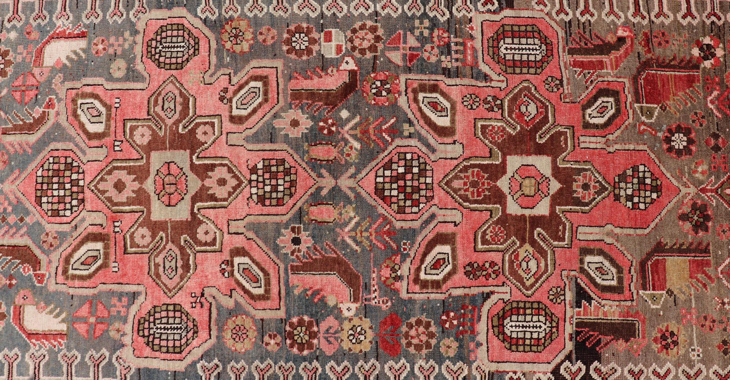 20th Century Antique Caucasian Karabagh Gallery Runner With Large Medallions Of Pink And Red For Sale