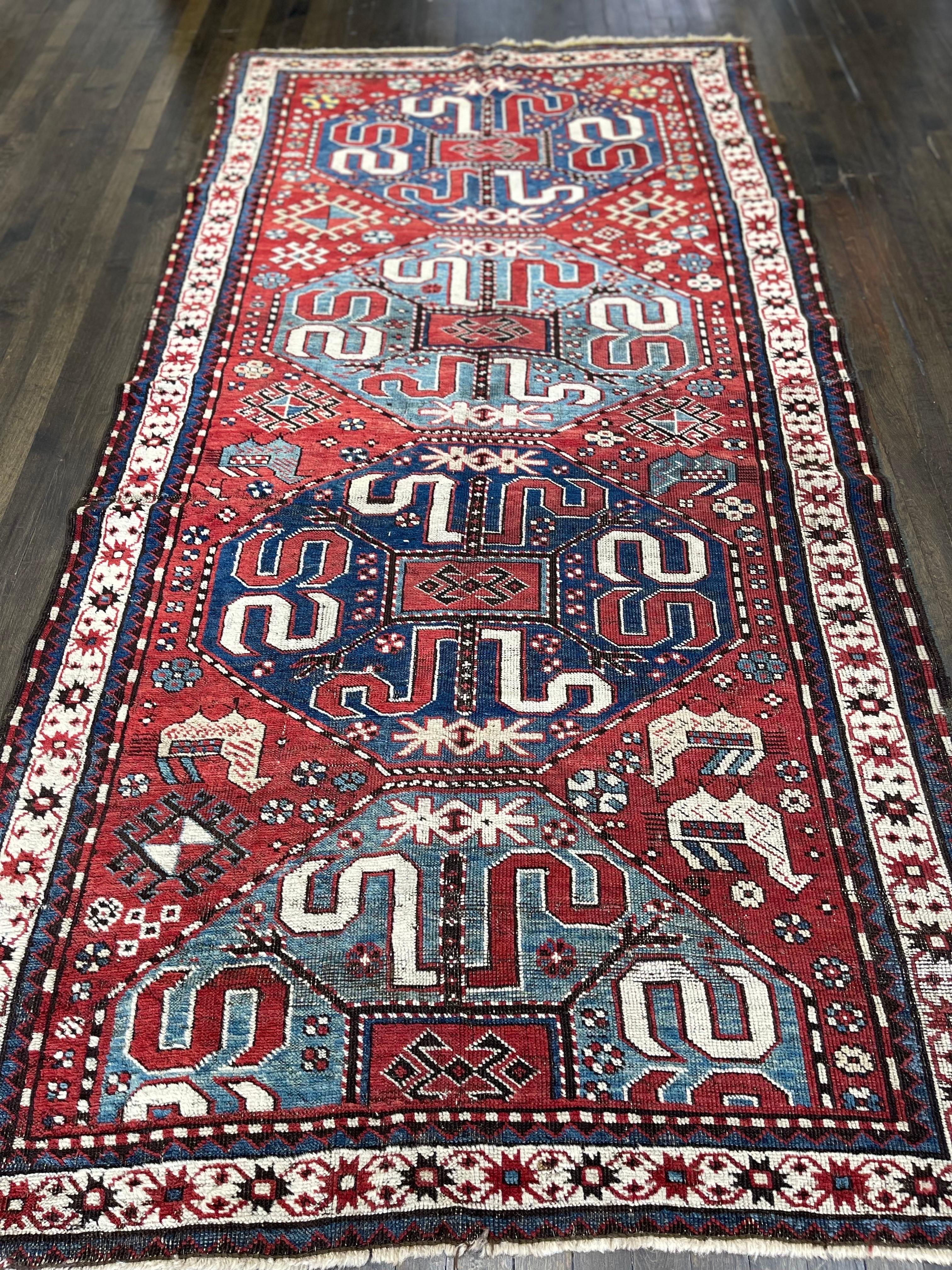 A very handsome example of an antique Kazak attributed to a village in the north-west part of Karabagh,this distinctive group of rugs are known as cloud-band Kazak. The adjectival description refers to the worm-like configurations within the