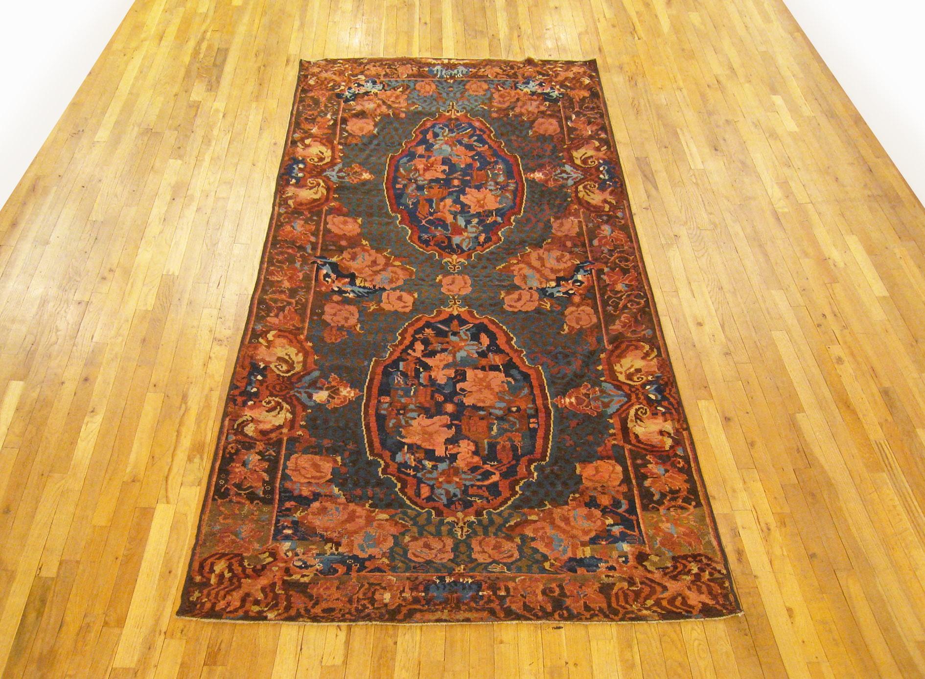 Antique Caucasian Karabagh Rug, Gallery size, circa 1870.

A one-of-a-kind antique Caucasian Karabagh Carpet, hand-knotted with soft wool pile. This lovely hand-knotted carpet features multiple medallions with a Gul Farang design on the blue