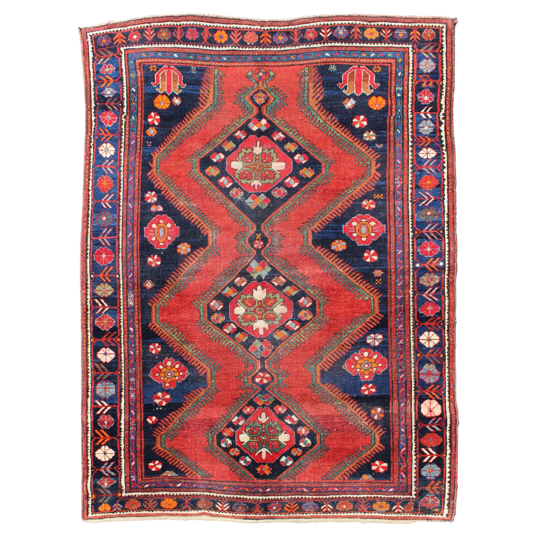 Tapis caucasien ancien du Karabagh rouge, bleu marine avec médaillons géométriques en vente