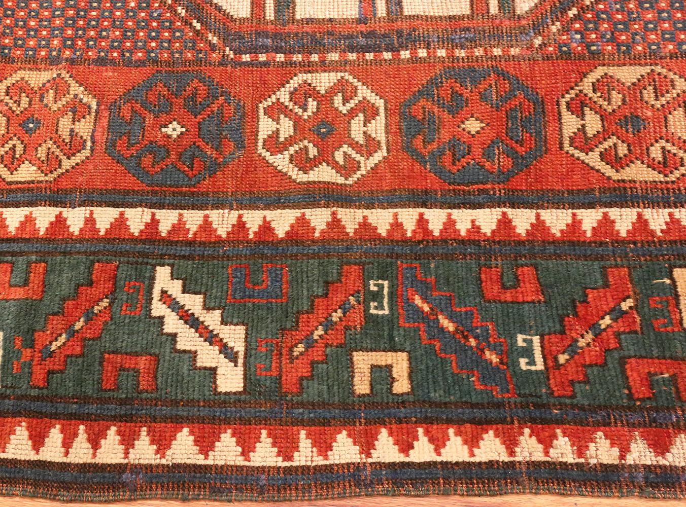A classically beautiful tribal and Primitive design antique Caucasian Karachopf rug, country of origin / rugs type: Antique Caucasian rugs, circa date: turn of the 20th century (circa 1900). Size: 5 ft 6 in x 7 ft 5 in (1.68 m x 2.26 m)

The