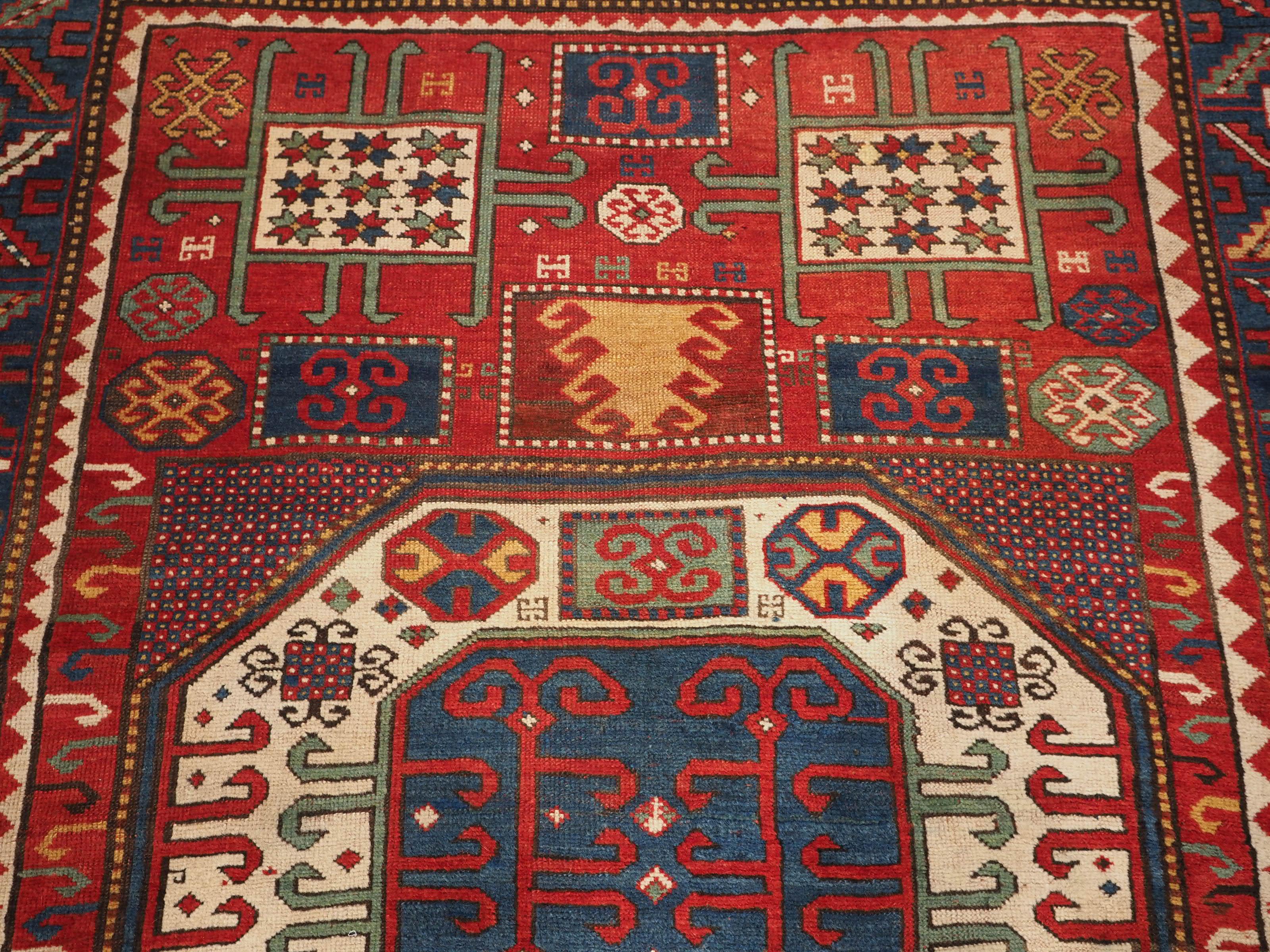 Wool Antique Caucasian Karachov Kazak Rug of Classic Design on a Red Ground
