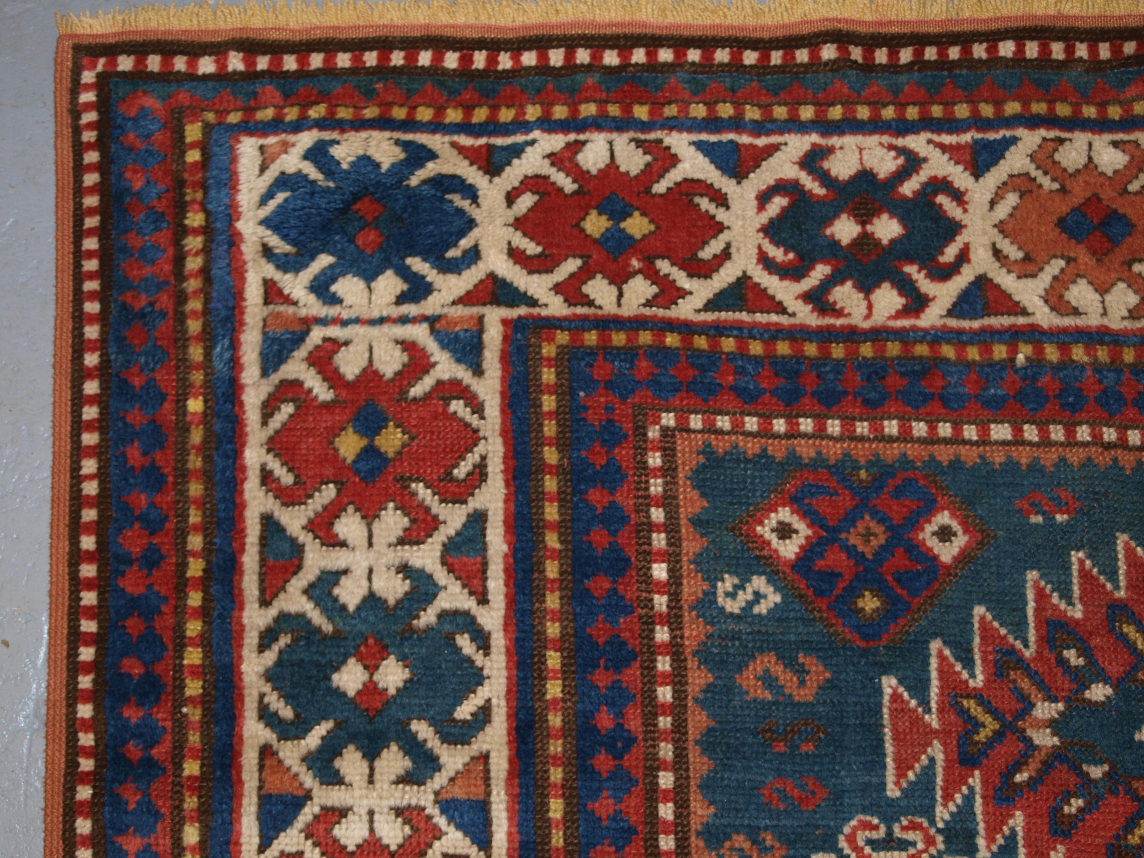 19th Century Antique Caucasian Karachov Kazak Rug on Green Ground For Sale