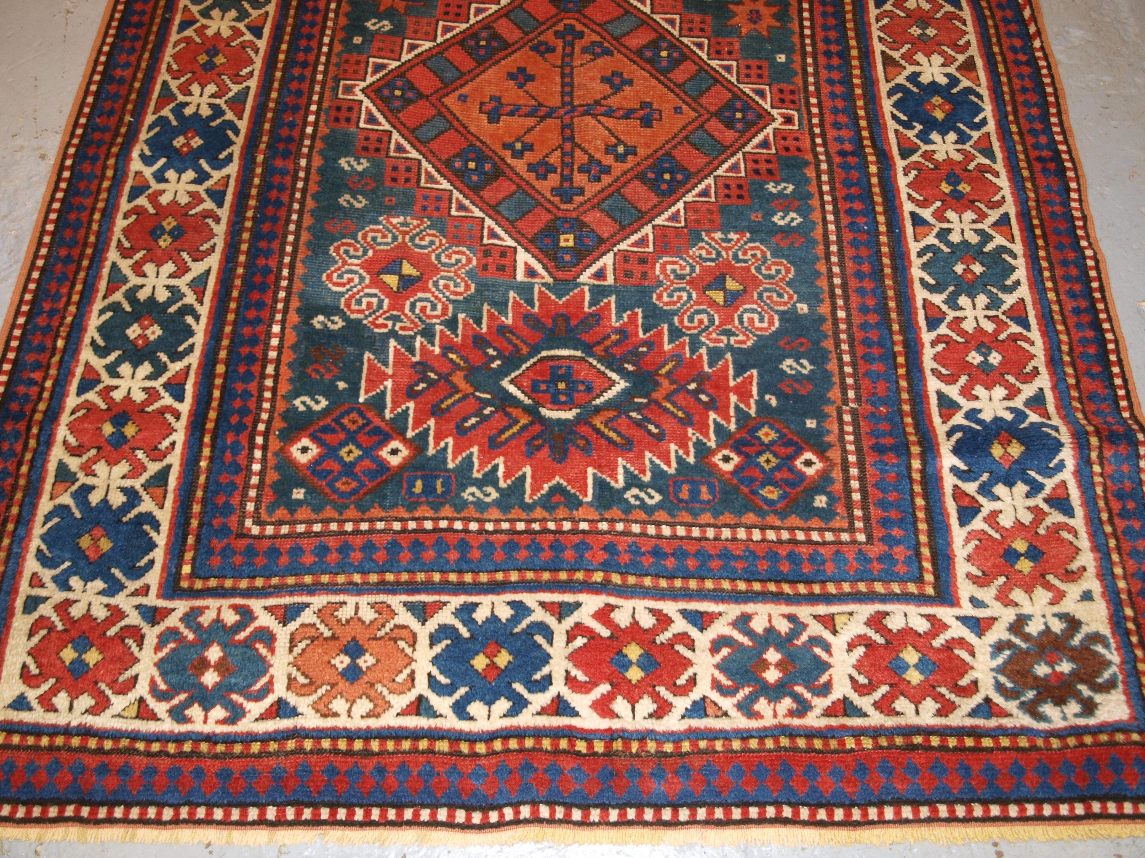 Antique Caucasian Karachov Kazak Rug on Green Ground For Sale 1