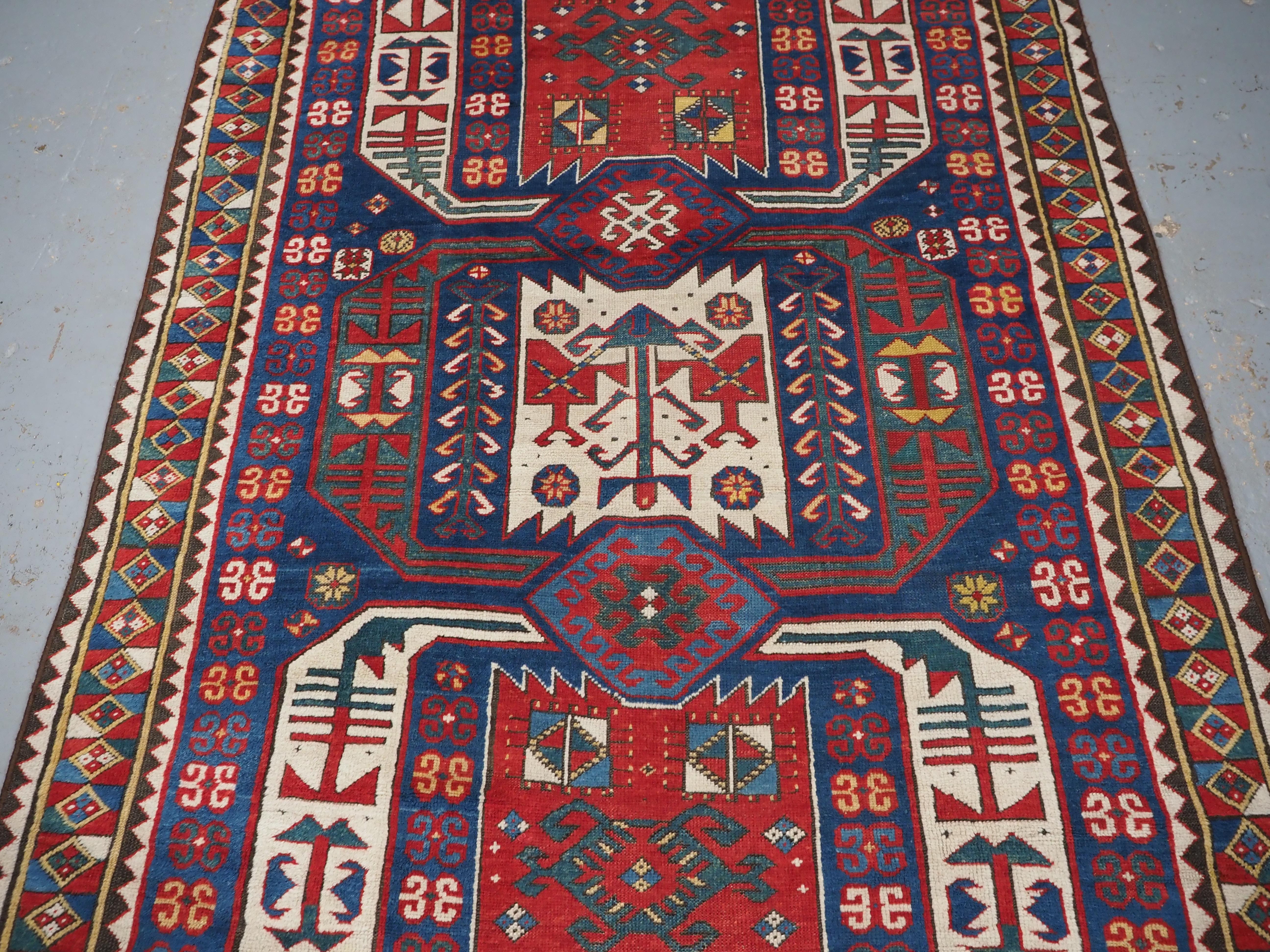 Mid-19th Century Antique Caucasian Kasim-Usag rug of classic design with superb colour., 1856. For Sale