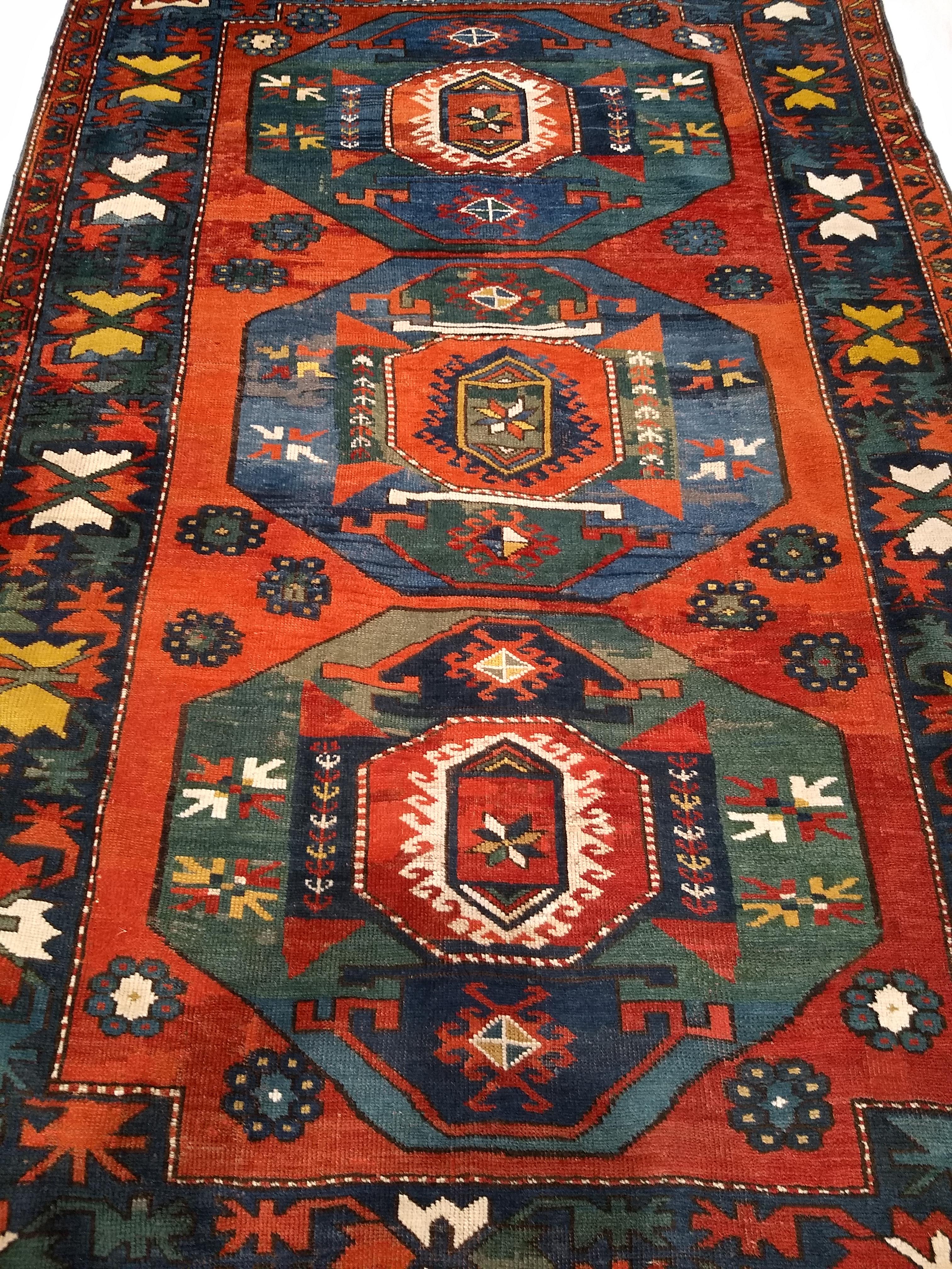 Vegetable Dyed 19th Century Caucasian Kazak in Medallion Pattern in Blue, Green, Yellow, Red For Sale