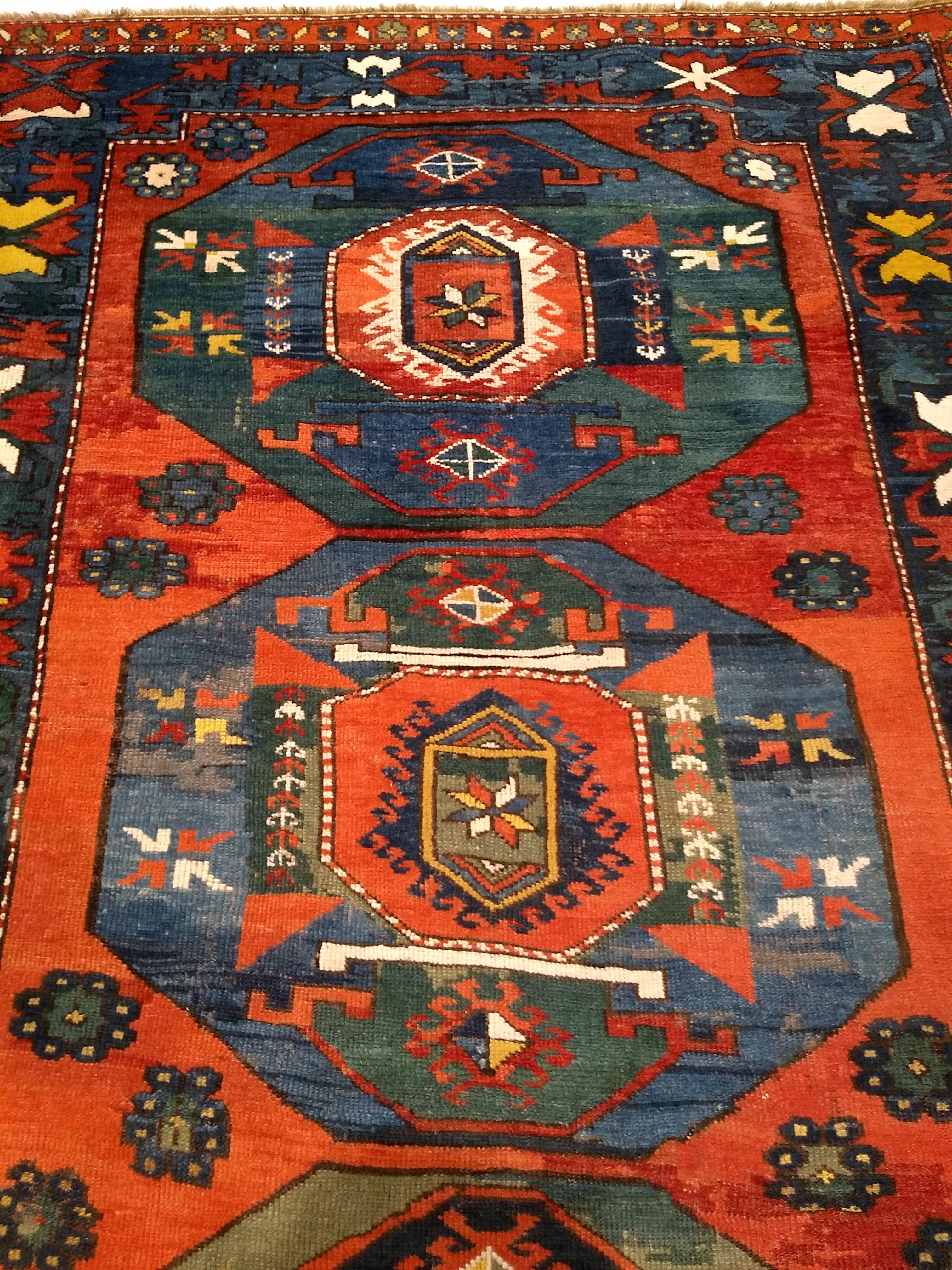 Wool 19th Century Caucasian Kazak in Medallion Pattern in Blue, Green, Yellow, Red For Sale