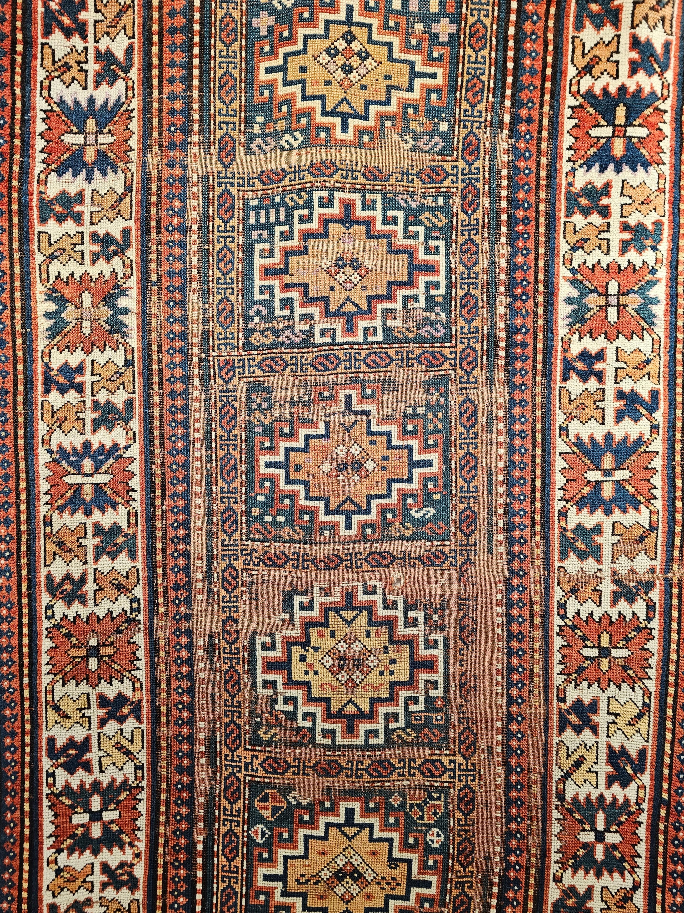 Vegetable Dyed 19th Century Caucasian Kazak Area Rug in Geometric Pattern in Blue, Ivory, Red For Sale