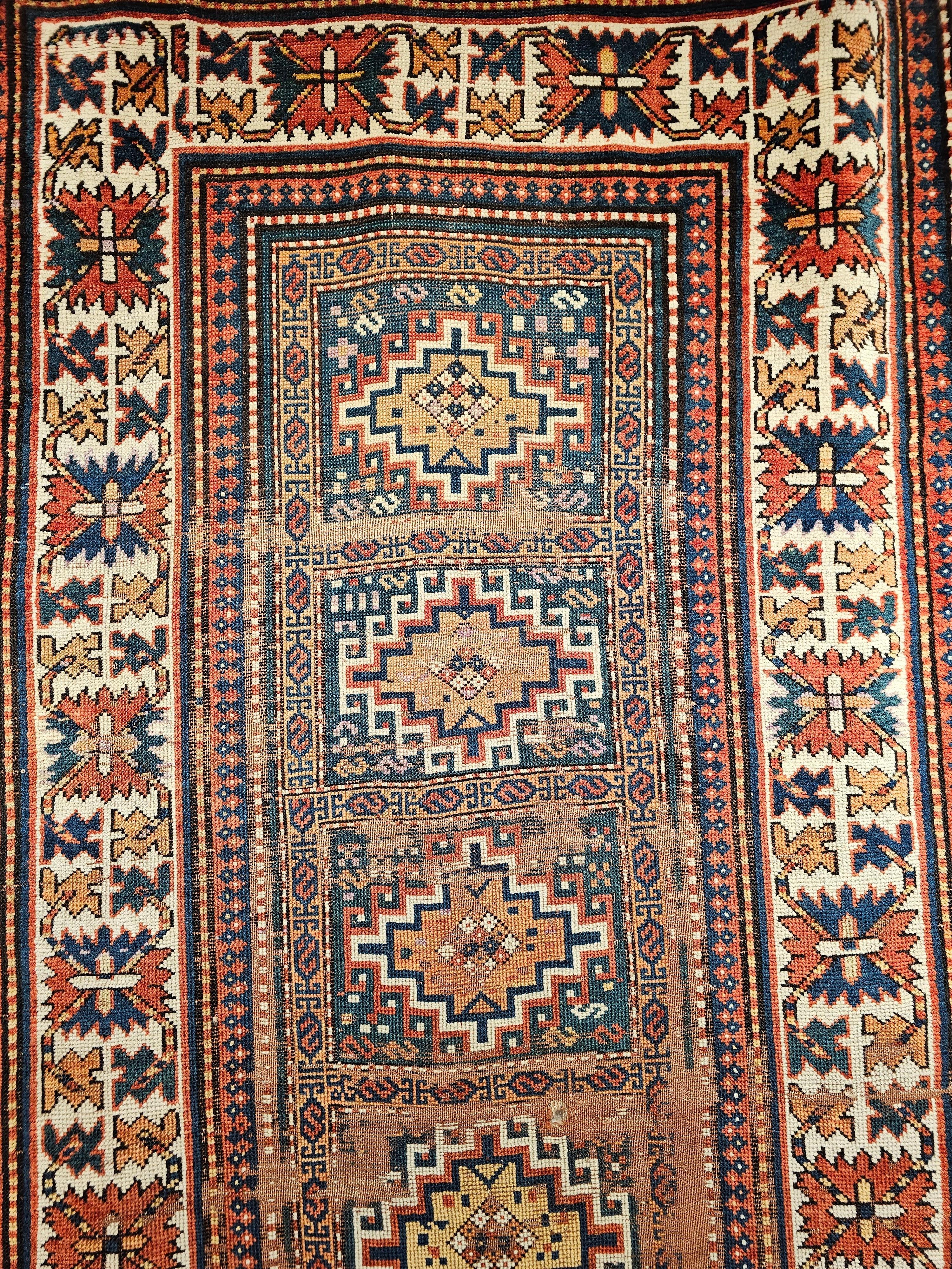 19th Century Caucasian Kazak Area Rug in Geometric Pattern in Blue, Ivory, Red In Good Condition For Sale In Barrington, IL