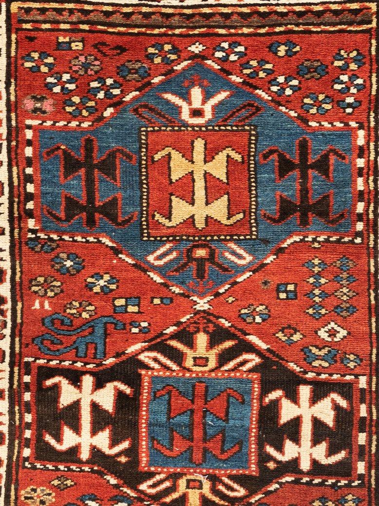 This lovely antique Caucasian Kazak carpet measures 4.1 x 5.11 ft. and is from the 1930s-1940s. It is in excellent condition.
 
  