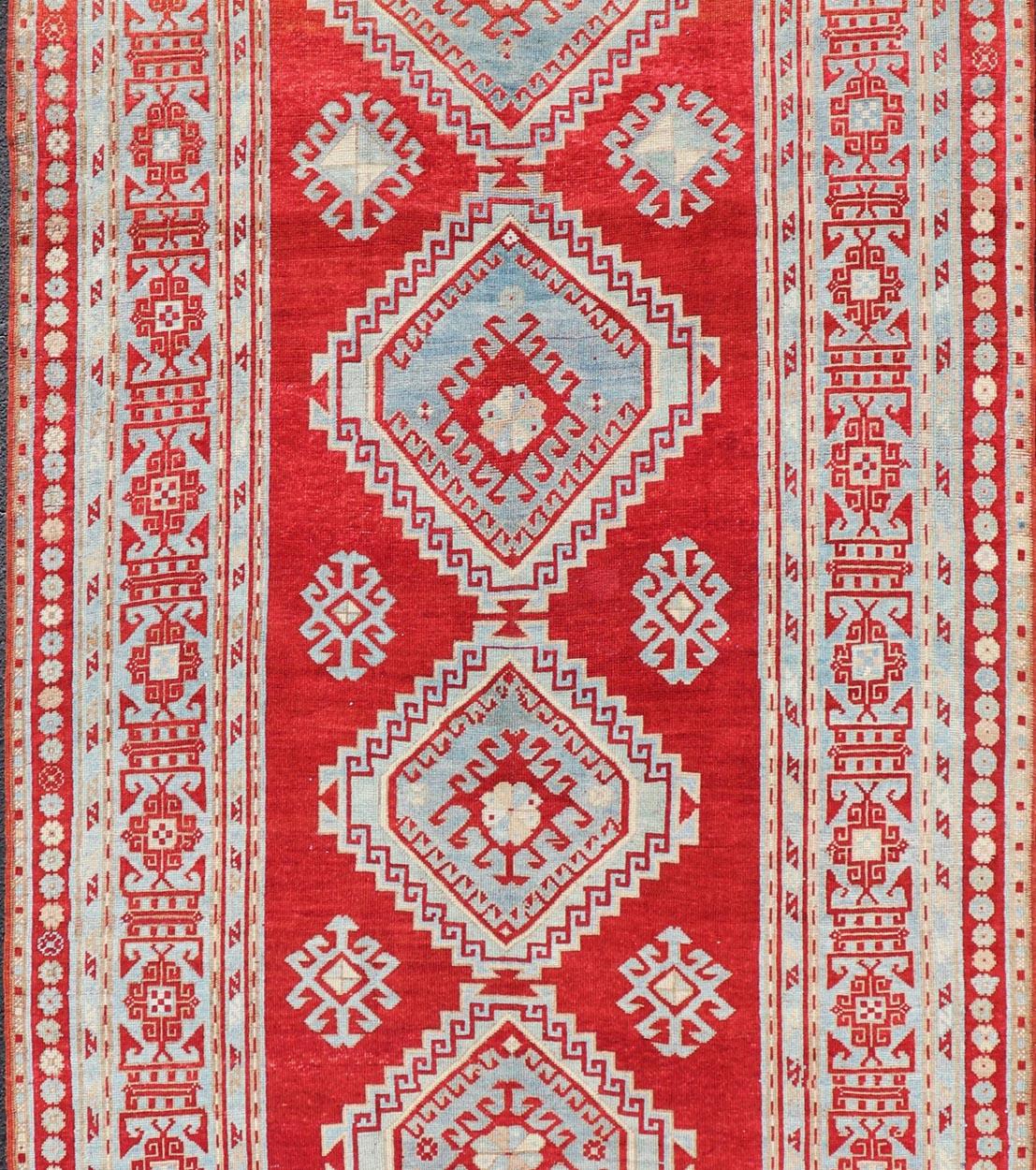 Hand-Knotted Antique Caucasian Kazak Gallery Rug in Brilliant Red with Geometric Design For Sale