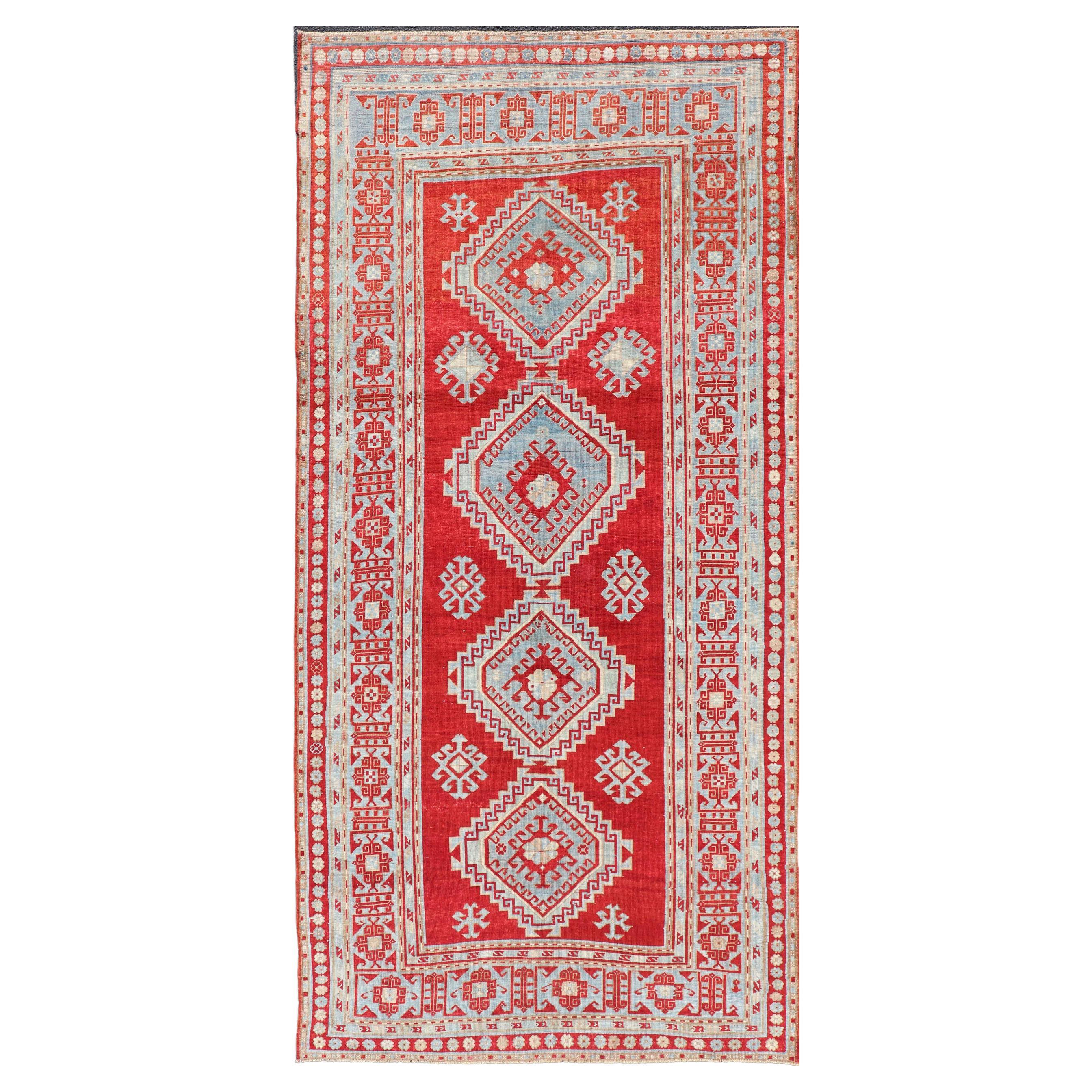 Antique Caucasian Kazak Gallery Rug in Brilliant Red with Geometric Design For Sale
