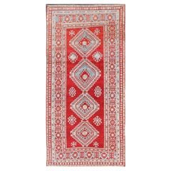 Antique Caucasian Kazak Gallery Rug in Brilliant Red with Geometric Design