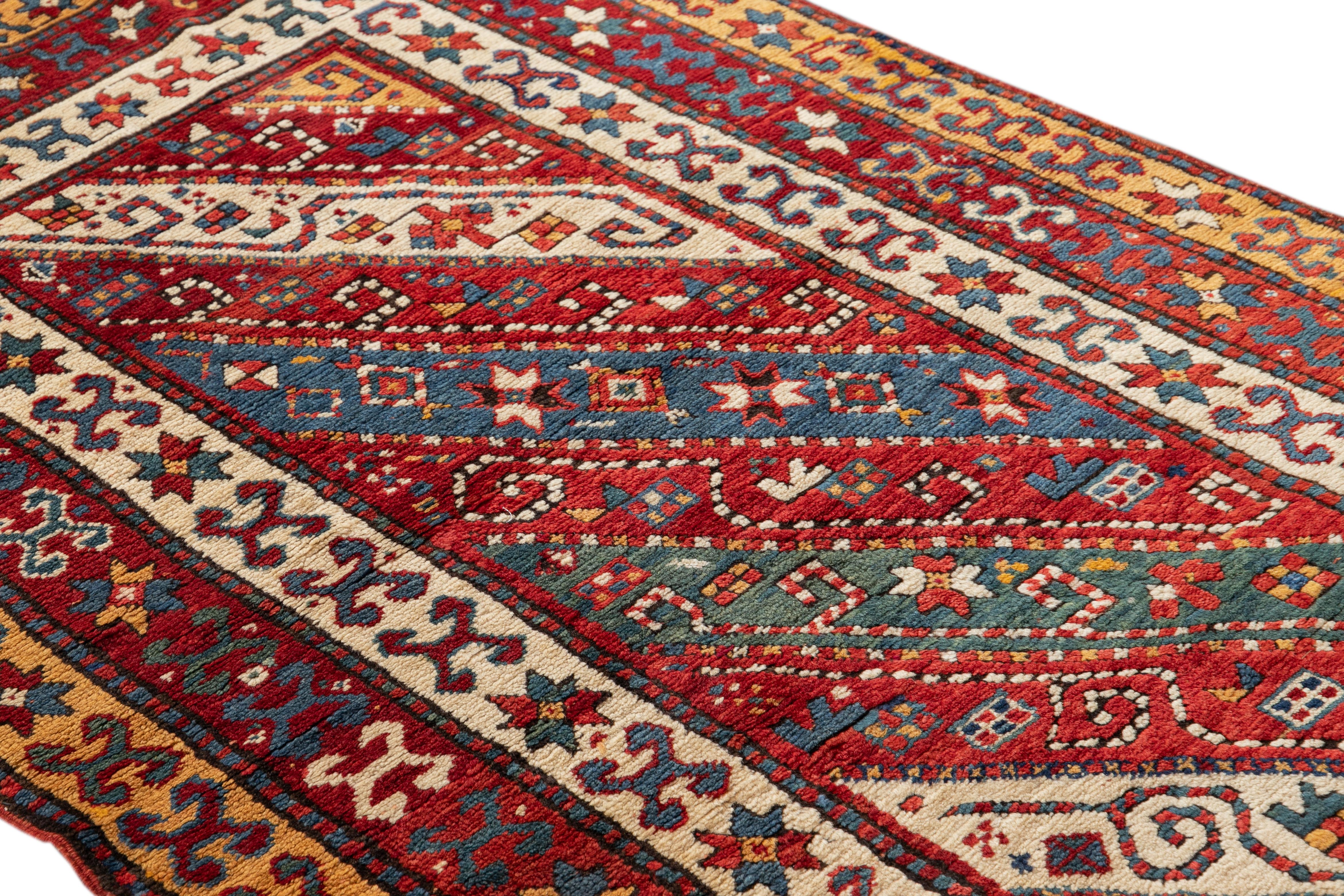 20th Century Antique Caucasian Kazak Handmade Gallery Wool Rug with Allover Multicolor Motif  For Sale