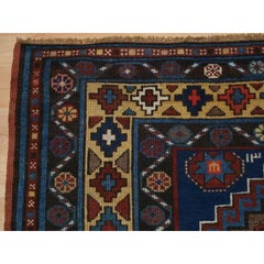 Antique Caucasian Kazak Long Rug with Repeat Medallion Design, circa 1900