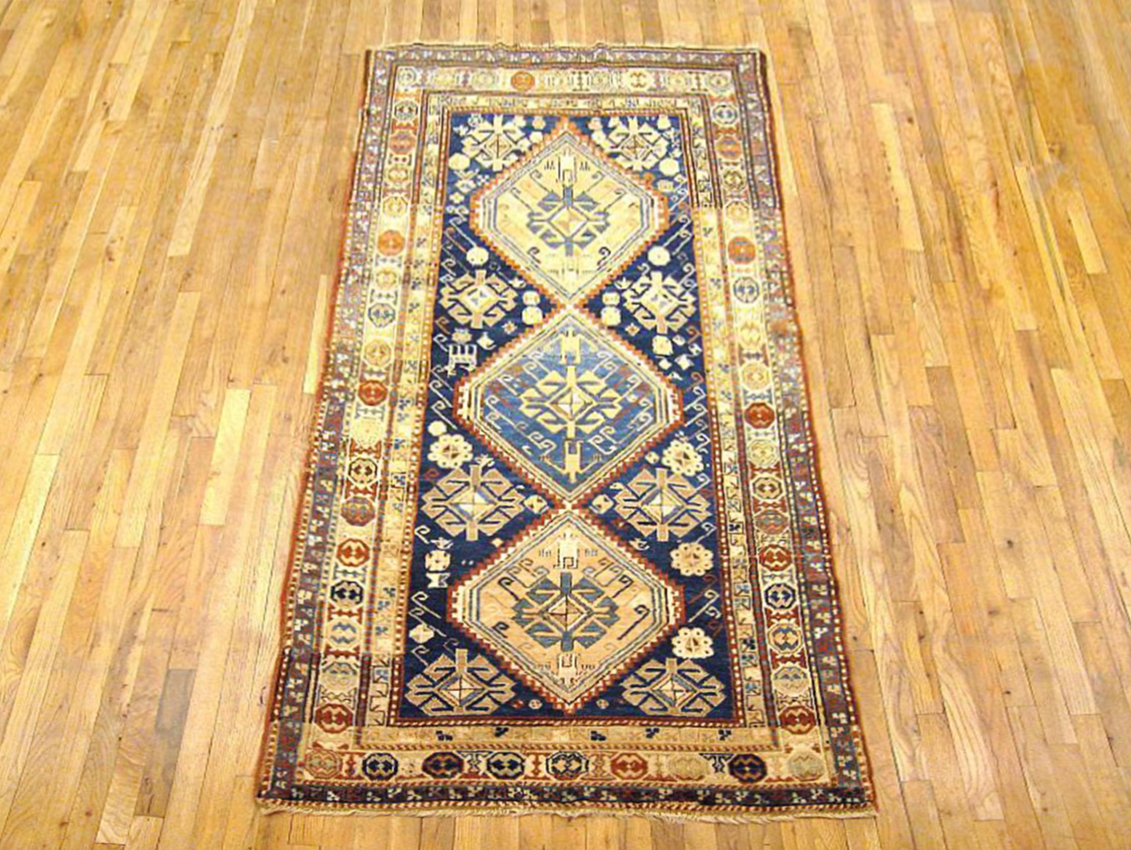 Antique Caucasian Kazak Oriental carpet in Gallery size, circa 1910

A one-of-a-kind antique Caucasian Kazak Oriental Carpet, hand-knotted with soft wool pile. This lovely hand-knotted wool rug features multiple medallions with geometric abstracts