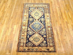 Antique Caucasian Kazak Oriental Rug in Gallery Size with Multiple Medallions