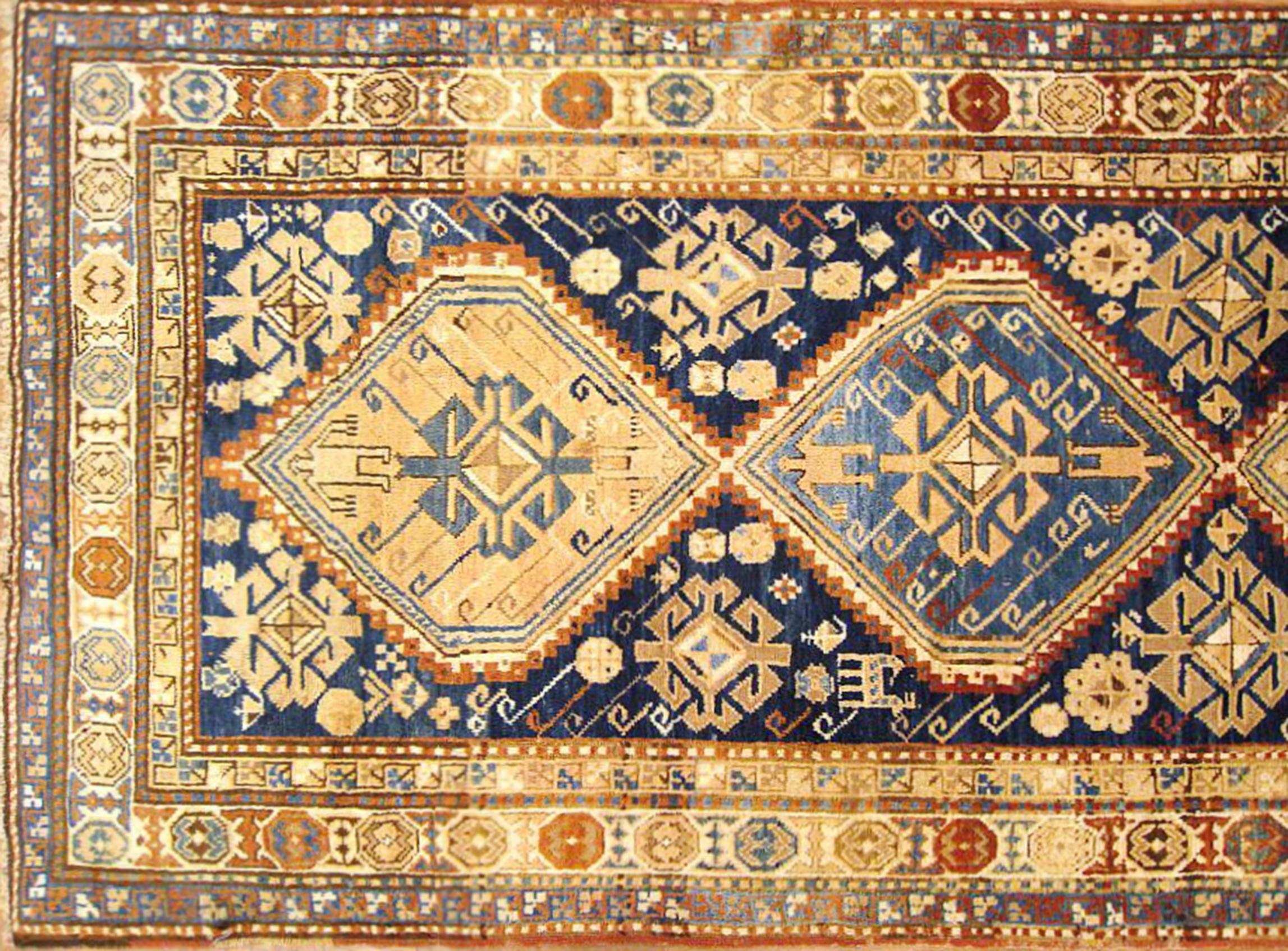 Hand-Knotted Antique Caucasian Kazak Oriental Rug in Gallery Size with Multiple Medallions For Sale