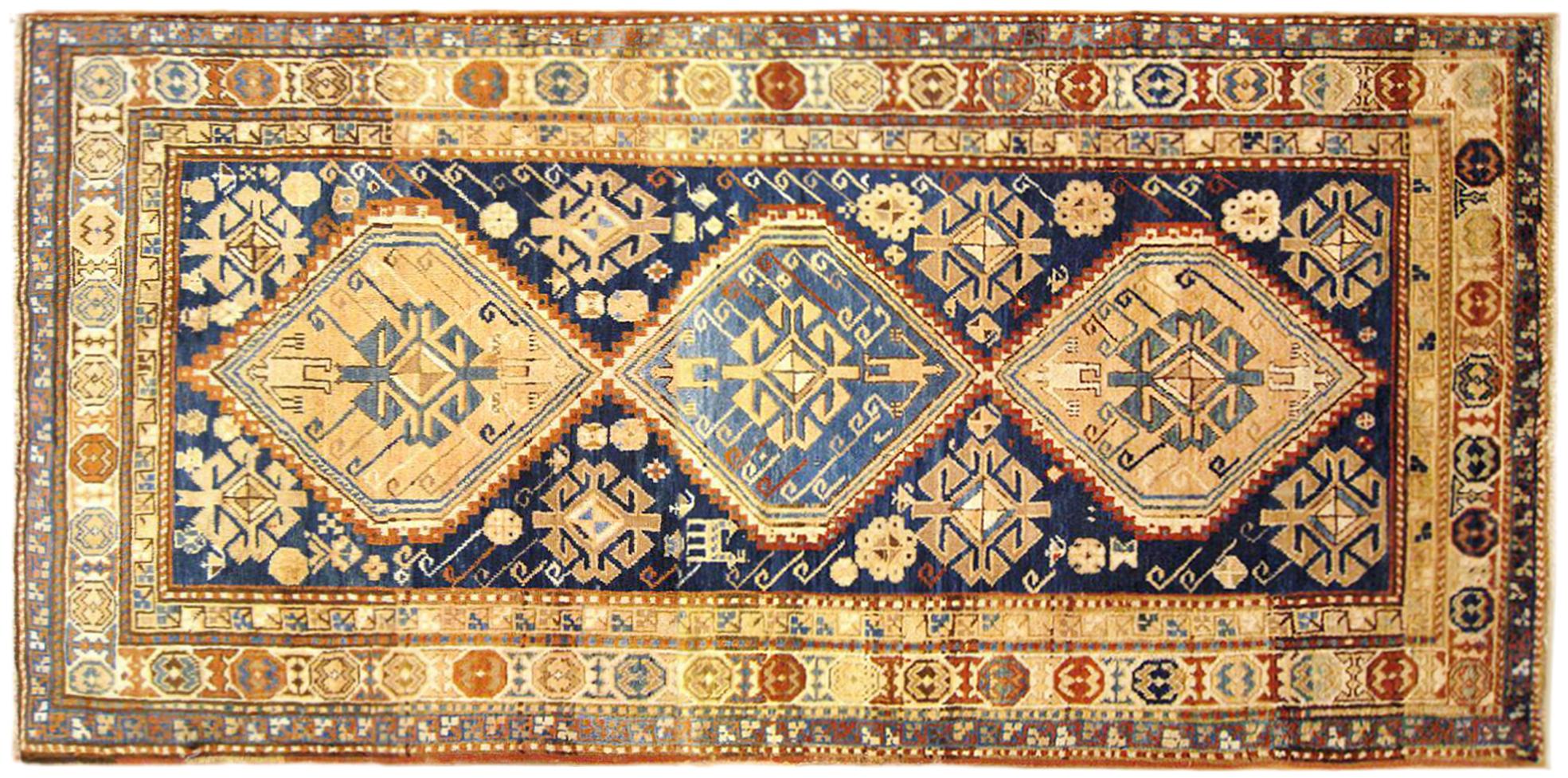 Antique Caucasian Kazak Oriental Rug in Gallery Size with Multiple Medallions For Sale
