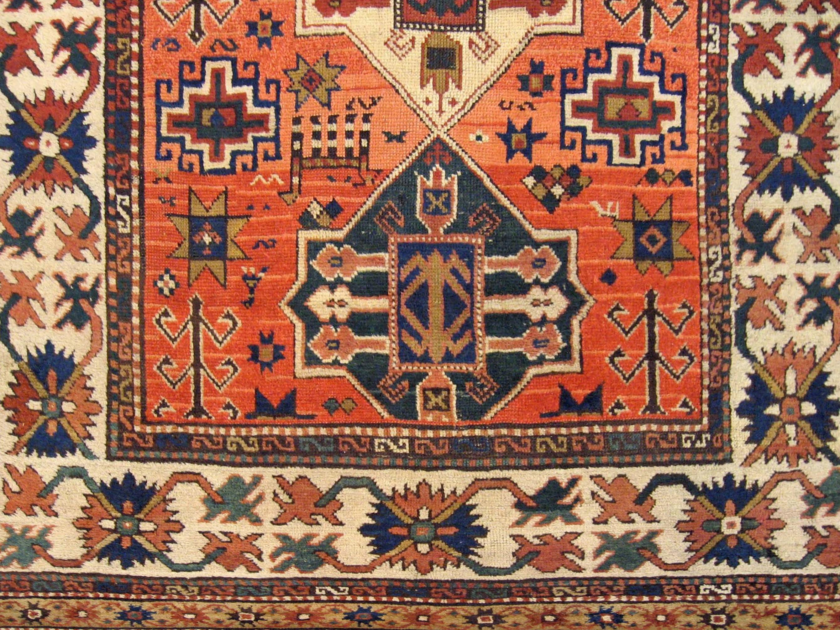 Hand-Knotted Antique Caucasian Kazak Oriental Rug in Room Size with Three Medallions For Sale