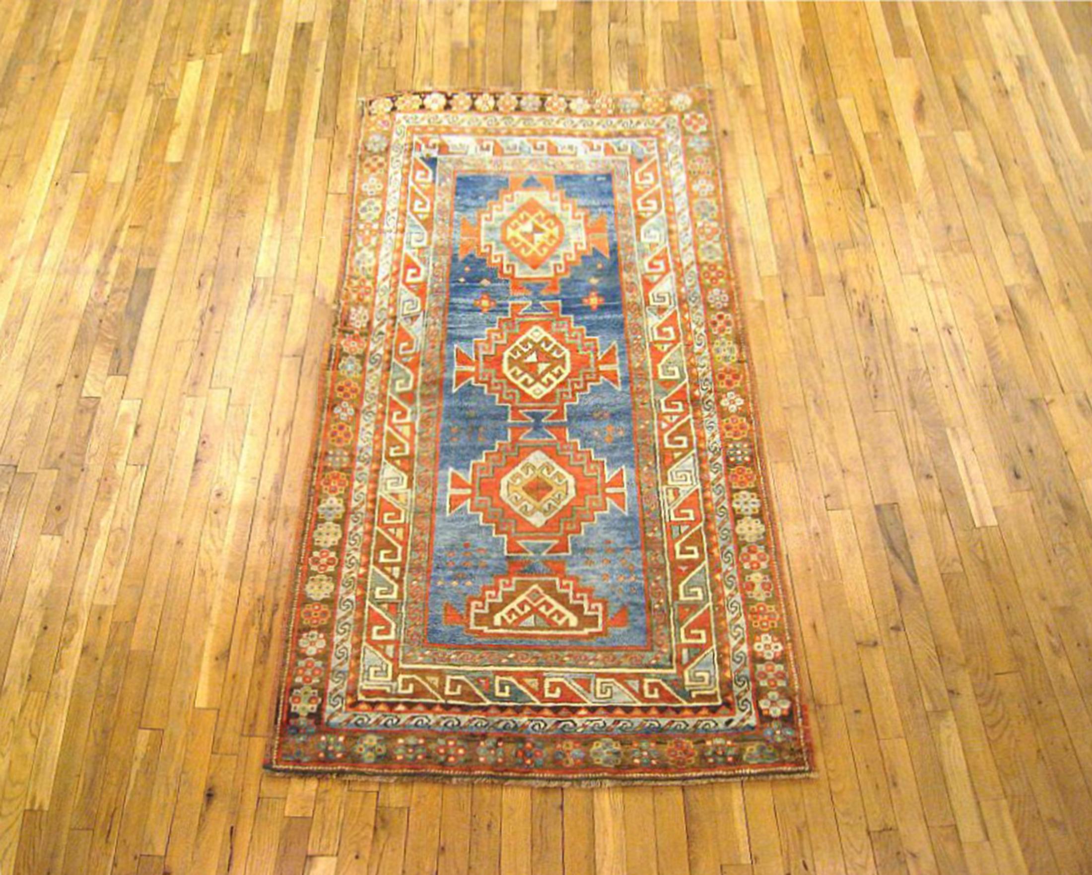 Antique Caucasian Kazak Oriental Carpet, Runner size, circa 1920

A one-of-a-kind antique Caucasian Kazak Oriental Carpet, hand-knotted with soft wool pile. This lovely hand-knotted wool rug features multiple medallions with geometric abstracts on