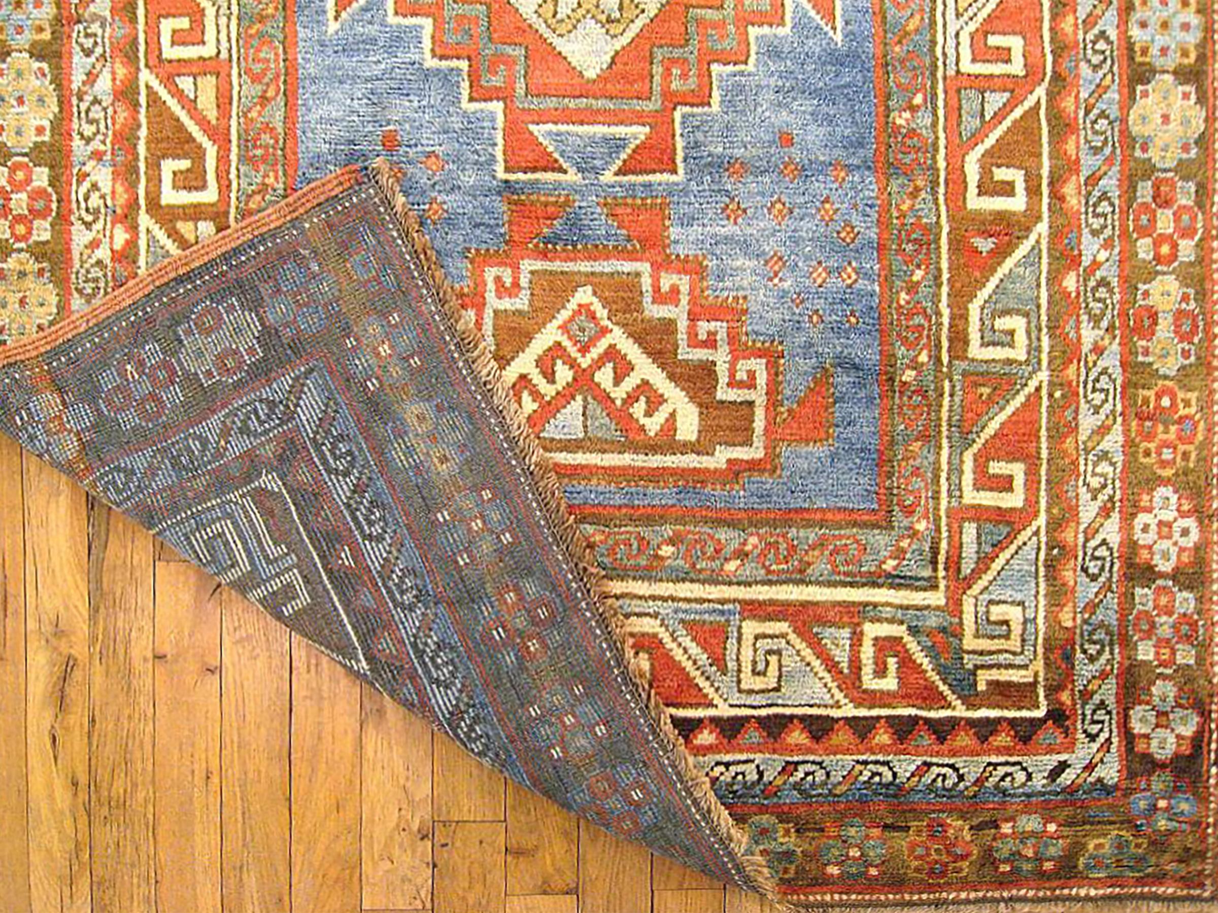 Antique Caucasian Kazak Oriental Rug in Runner Size with Multiple Medallions In Good Condition For Sale In New York, NY