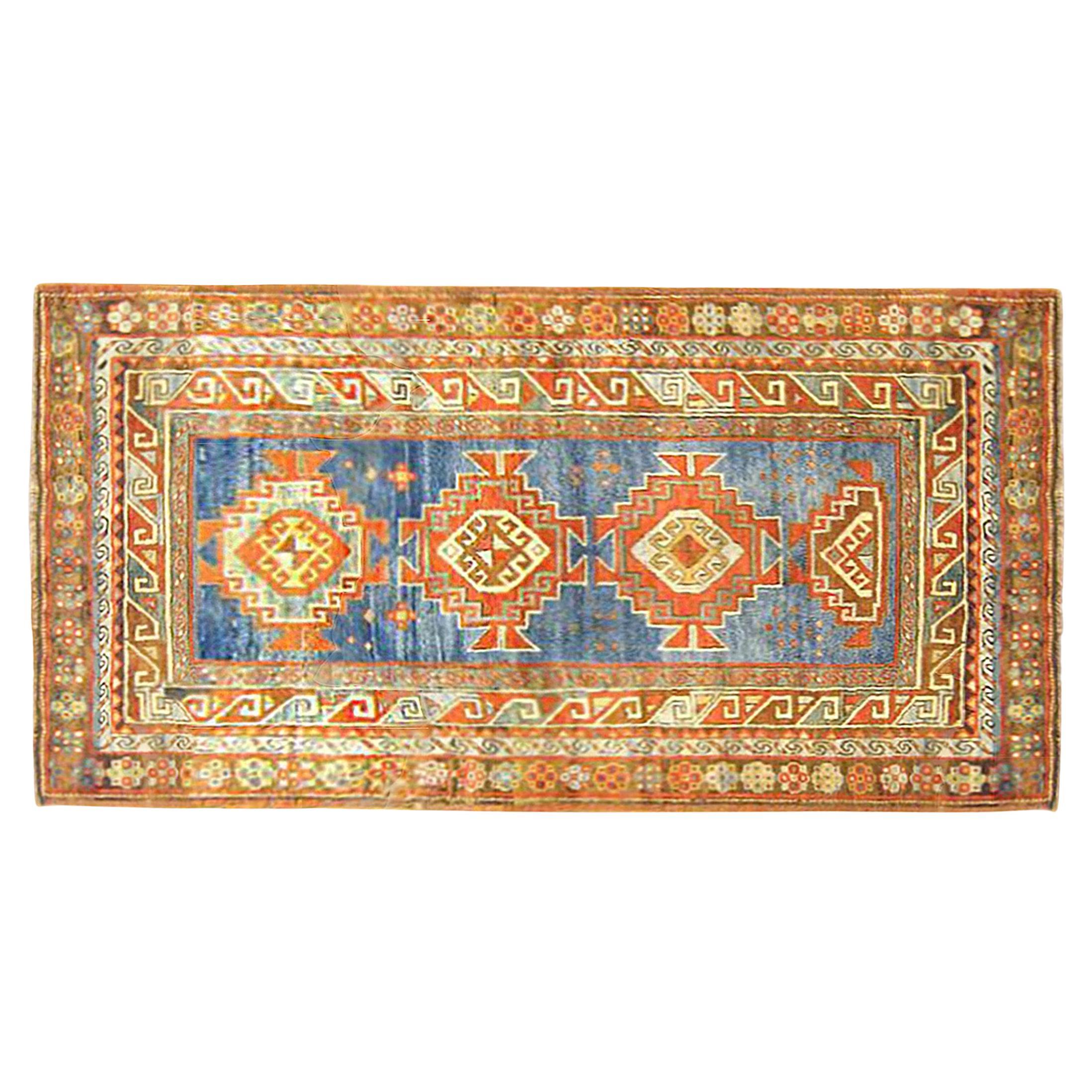Antique Caucasian Kazak Oriental Rug in Runner Size with Multiple Medallions For Sale
