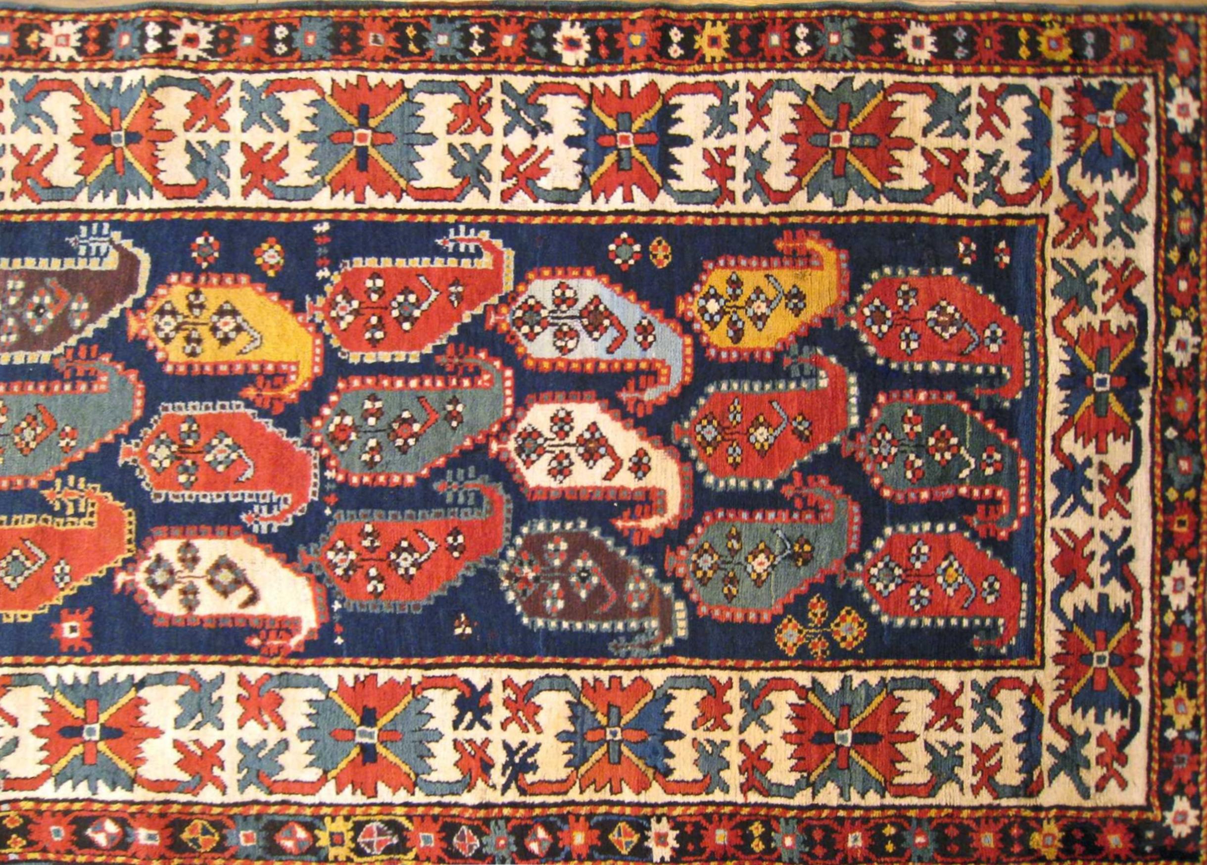 Hand-Knotted Antique Caucasian Kazak Oriental Rug in Runner Size with Paisley Design For Sale