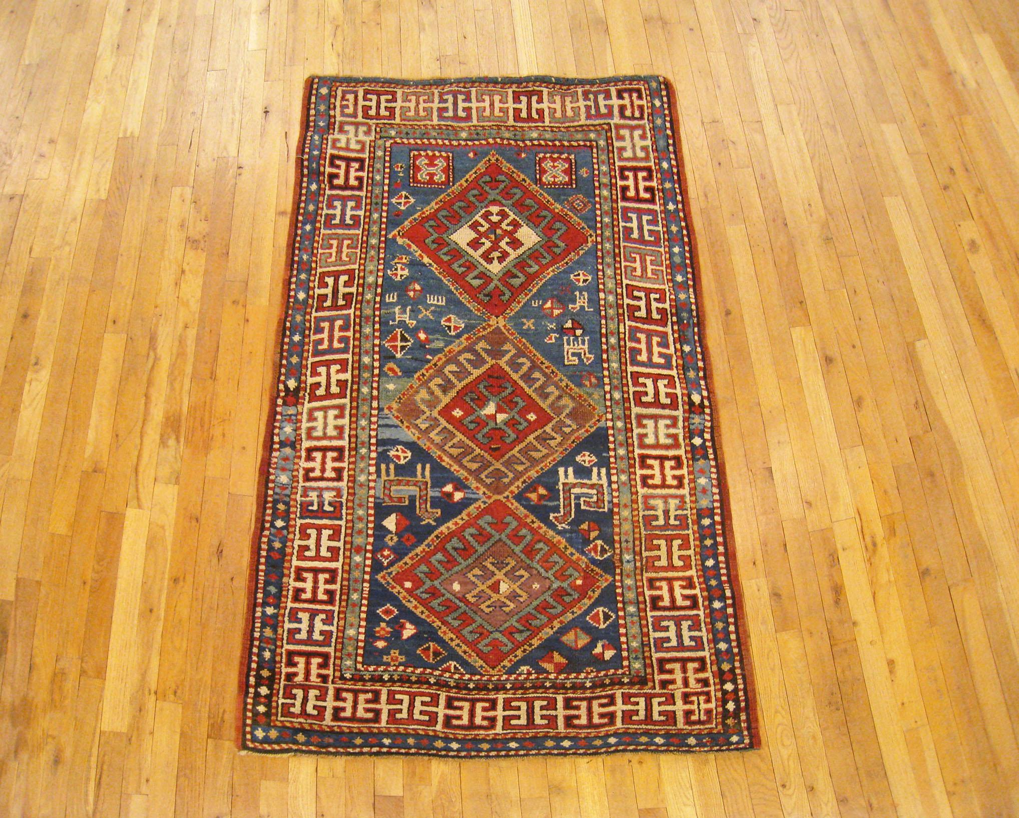 Antique Caucasian Kazak Oriental Carpet, Small size, circa 1900

A one-of-a-kind antique Caucasian Kazak Oriental Carpet, hand-knotted with soft wool pile. This lovely hand-knotted wool rug features multiple medallions in a diamond design on the
