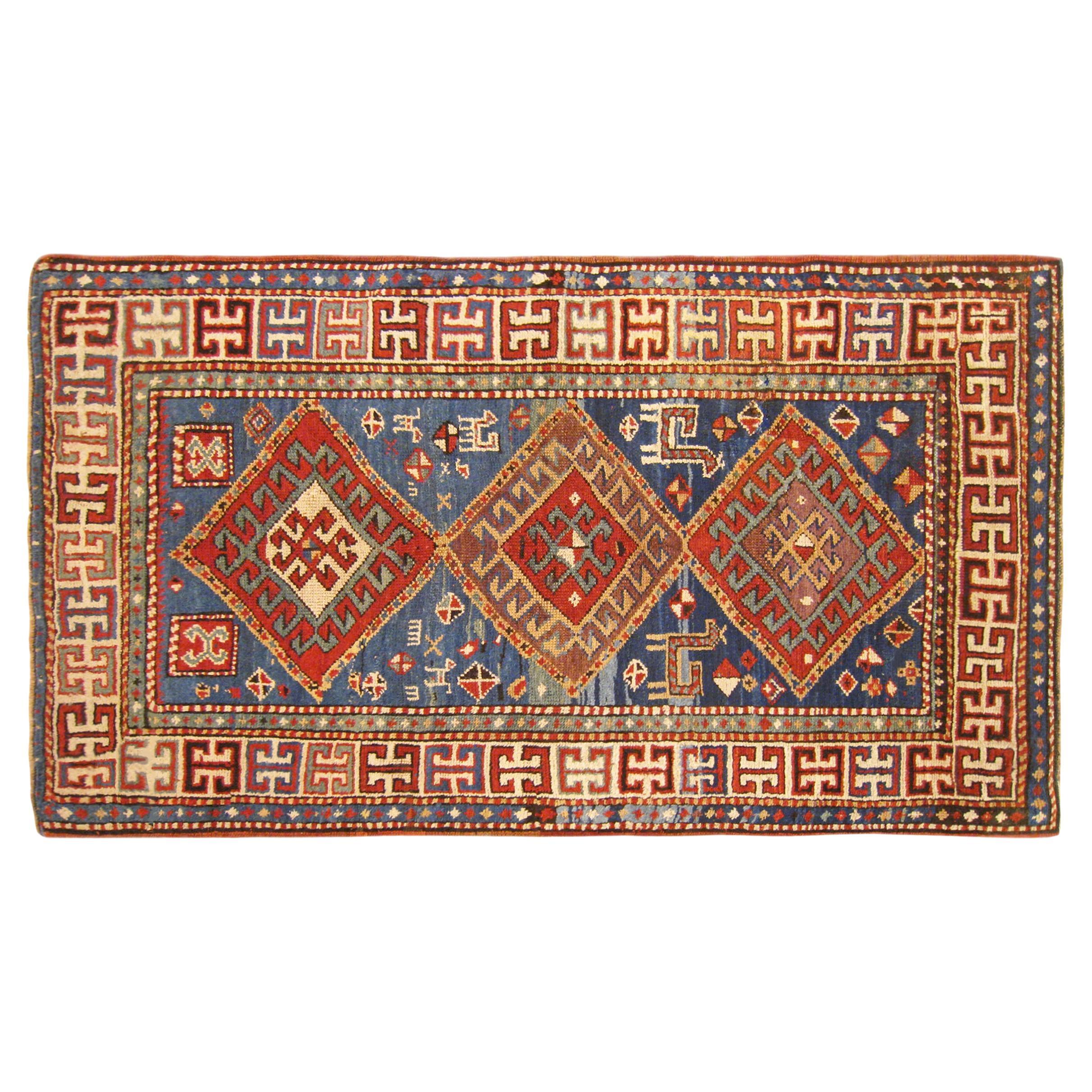 Antique Caucasian Kazak Oriental Rug in Small Size with Multiple Medallions For Sale