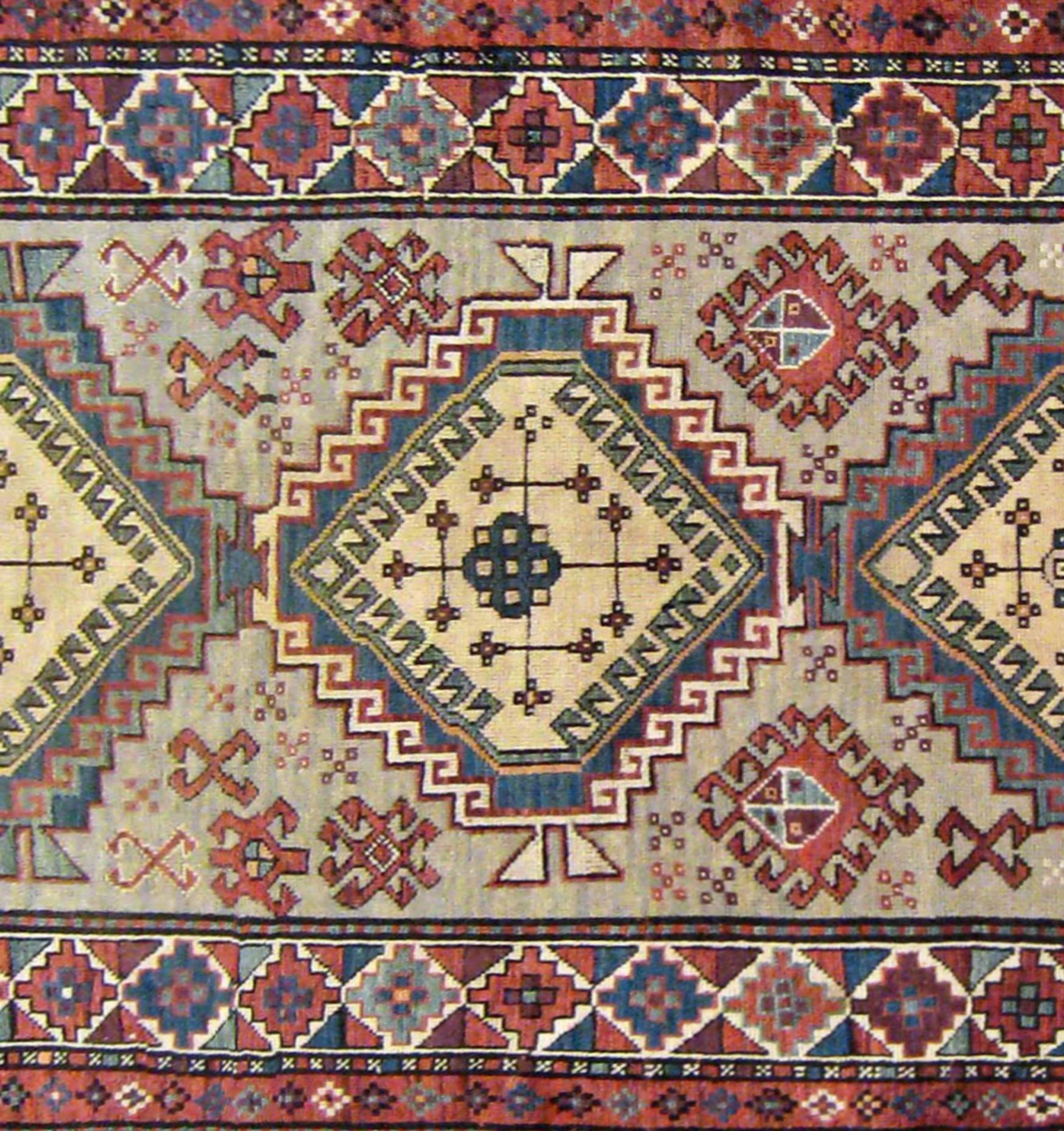 Antique Caucasian Kazak Oriental Rug in Small Size with Three Medallions  In Good Condition For Sale In New York, NY