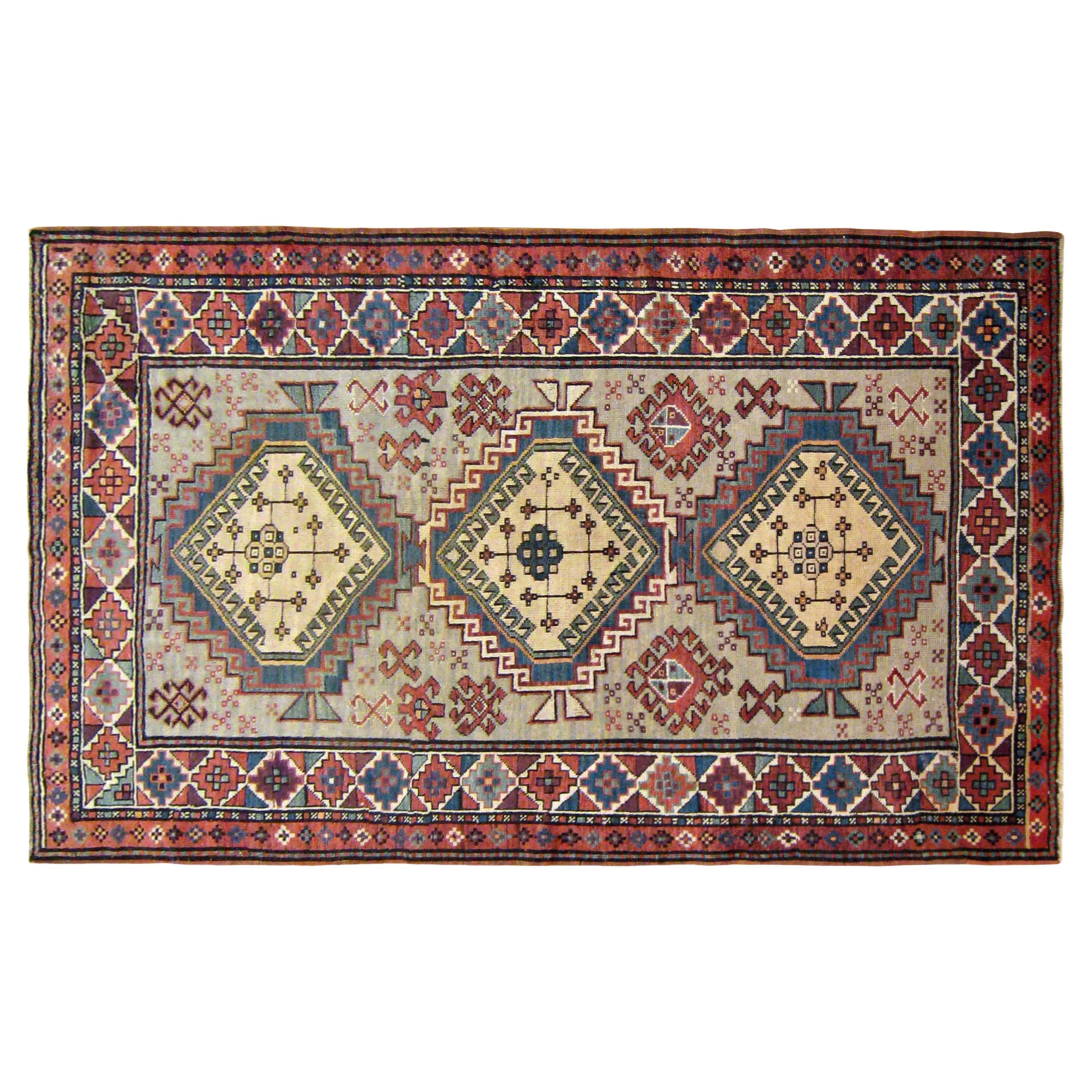 Antique Caucasian Kazak Oriental Rug in Small Size with Three Medallions  For Sale