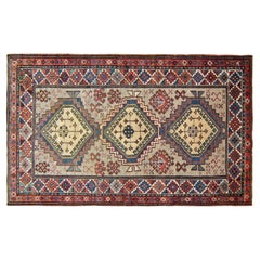 Antique Caucasian Kazak Oriental Rug in Small Size with Three Medallions 
