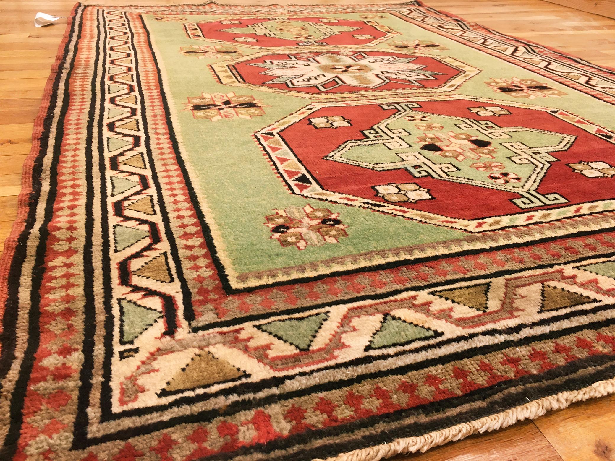 Early 20th Century Antique Caucasian Kazak Oriental Rug, in Small Squarish Size w/ Green Background For Sale