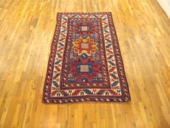 Antique Caucasian Kazak Oriental Rug, Small Size, Starburst Design & Blue Field