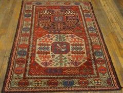 Exceptional Red Scarlet Color and Symmetrical Design Antique Caucasian Kazak Rug