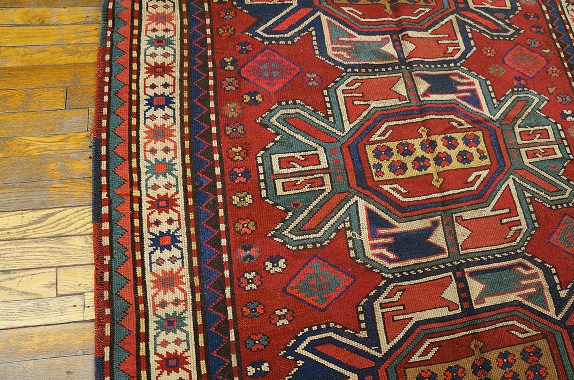 Noué à la main Tapis caucasien - Kazak du début du 20e siècle ( 4' 8'' x 9' 6'' - 142 x 289 cm) en vente